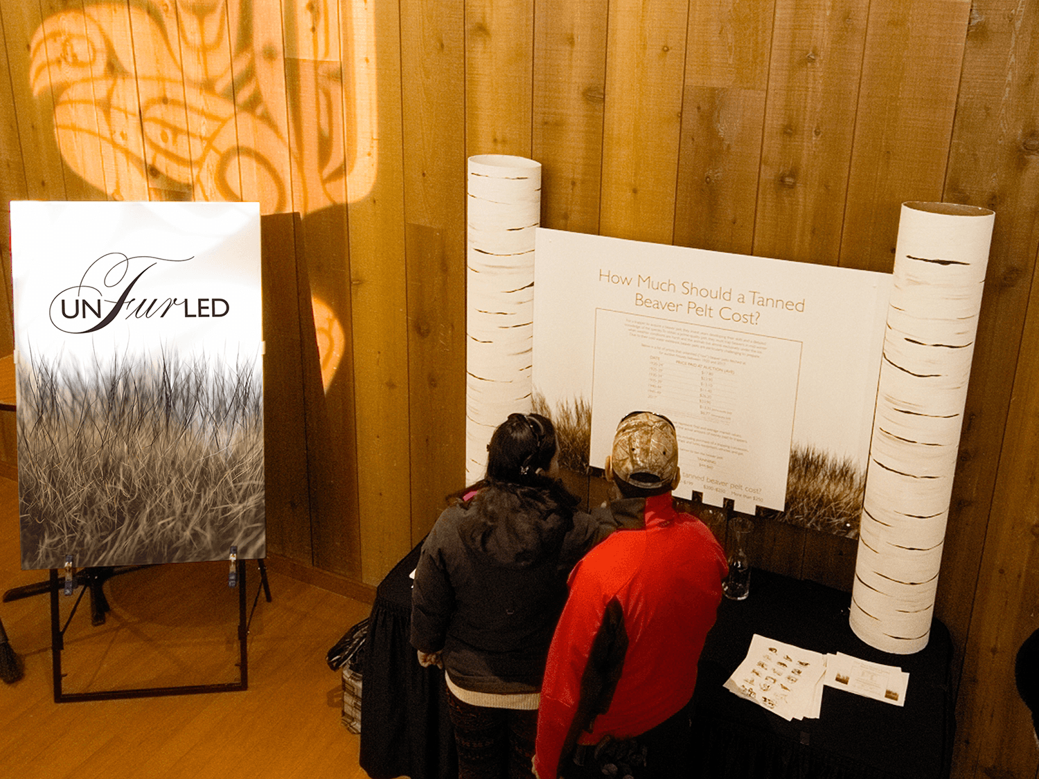 Event photograph by Christian Cuntz showing an image of Unfurled interpretive panel created for Shot in the Dark Productions in 2018