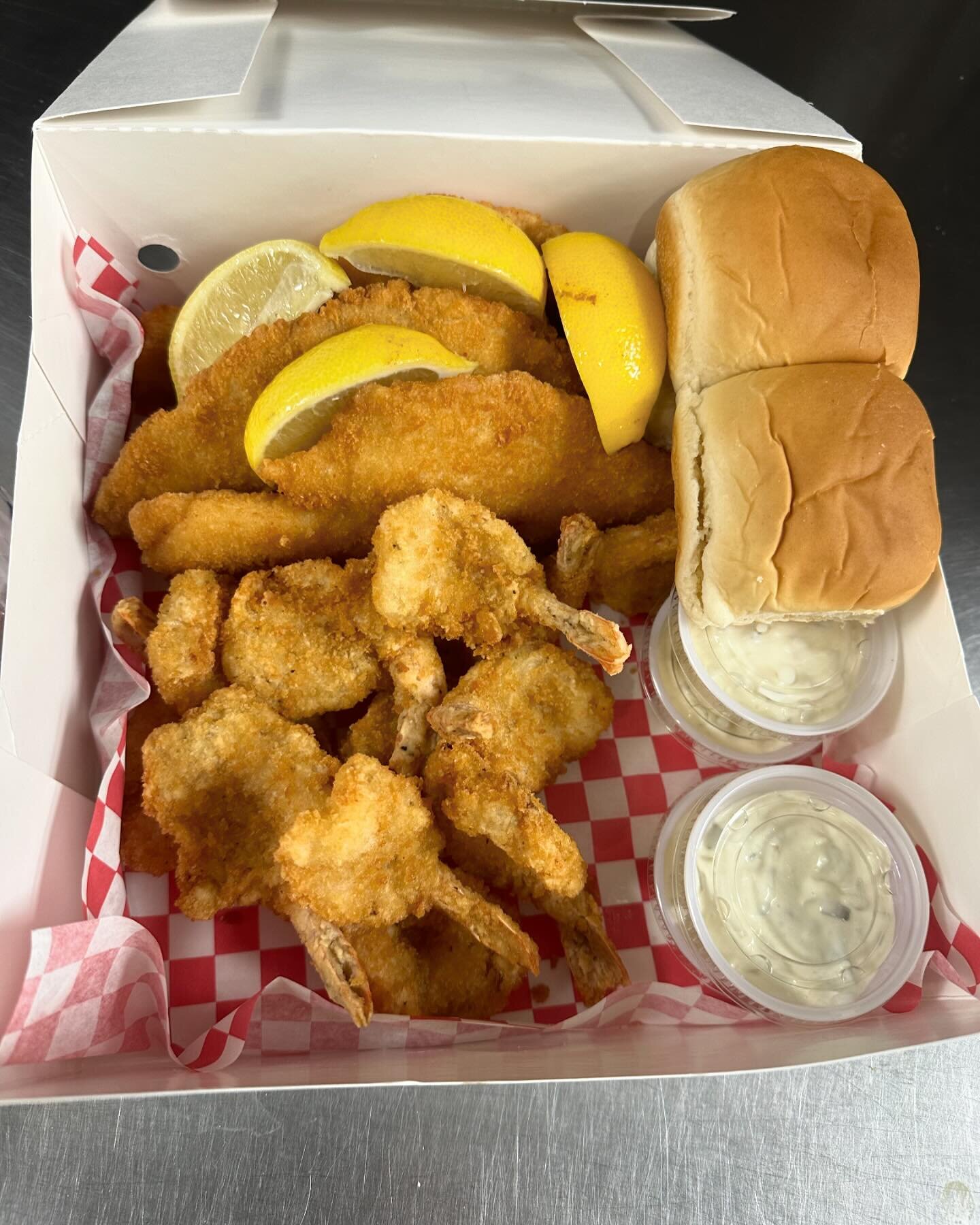 Family seafood box, 4 flounder filets, 12 hand breaded shrimp, 8 homemade tartar sauce, 4 rolls, lemon wedges and 2 family sides for $54.99! Come get one. #vicksfamoushamburgers #homeoftheultimateburger #fishfriday