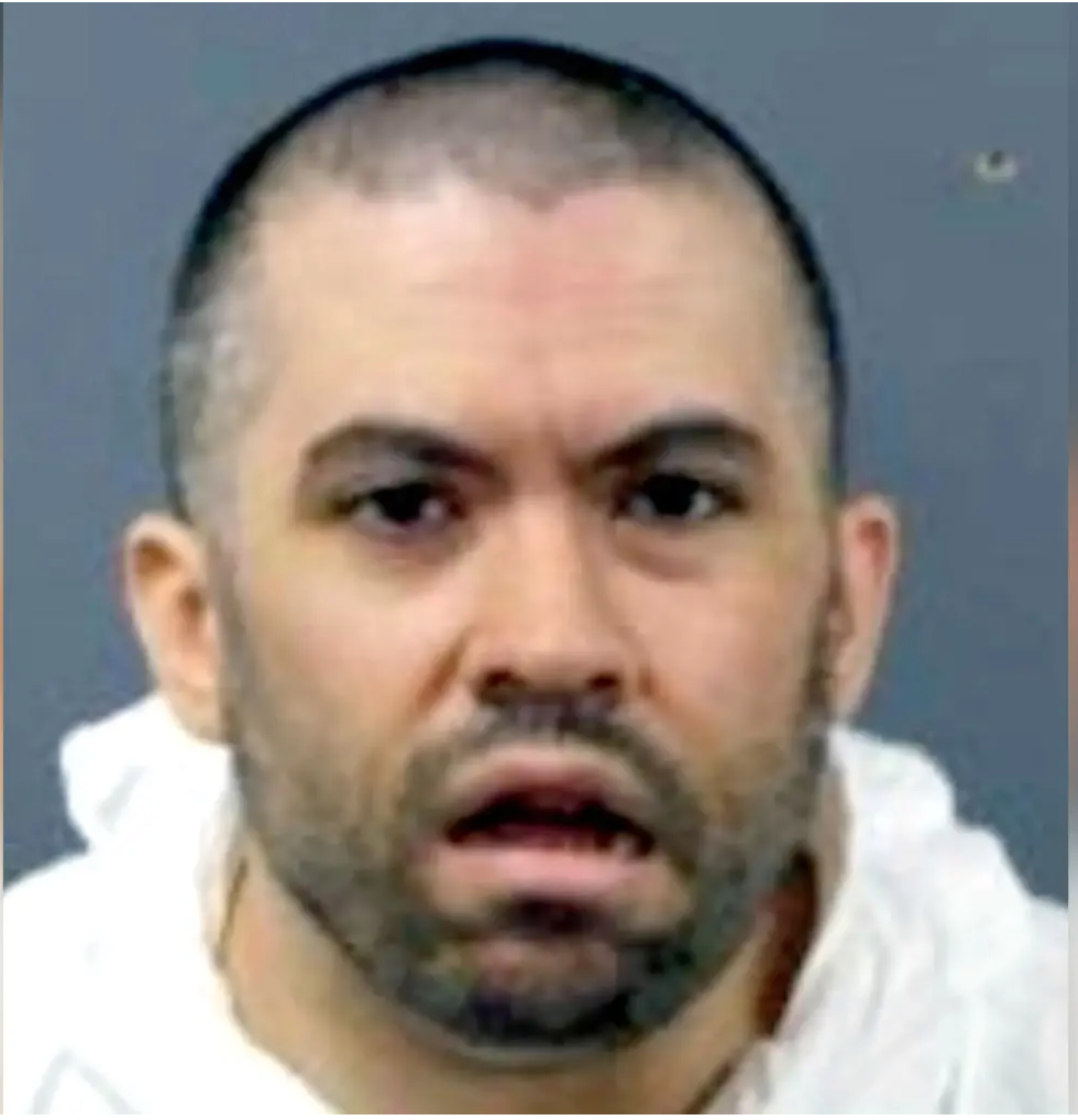 Dumont Man Attacked Mother with Fire Poker