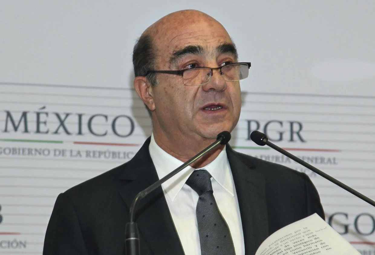 Mexico's ex-AG charged for mishandling mass disappearance case