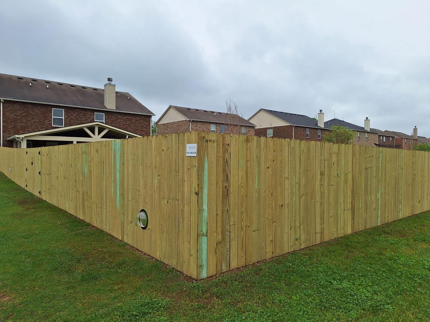 Dog ear privacy fence with a little surprise for the pups! 🐶