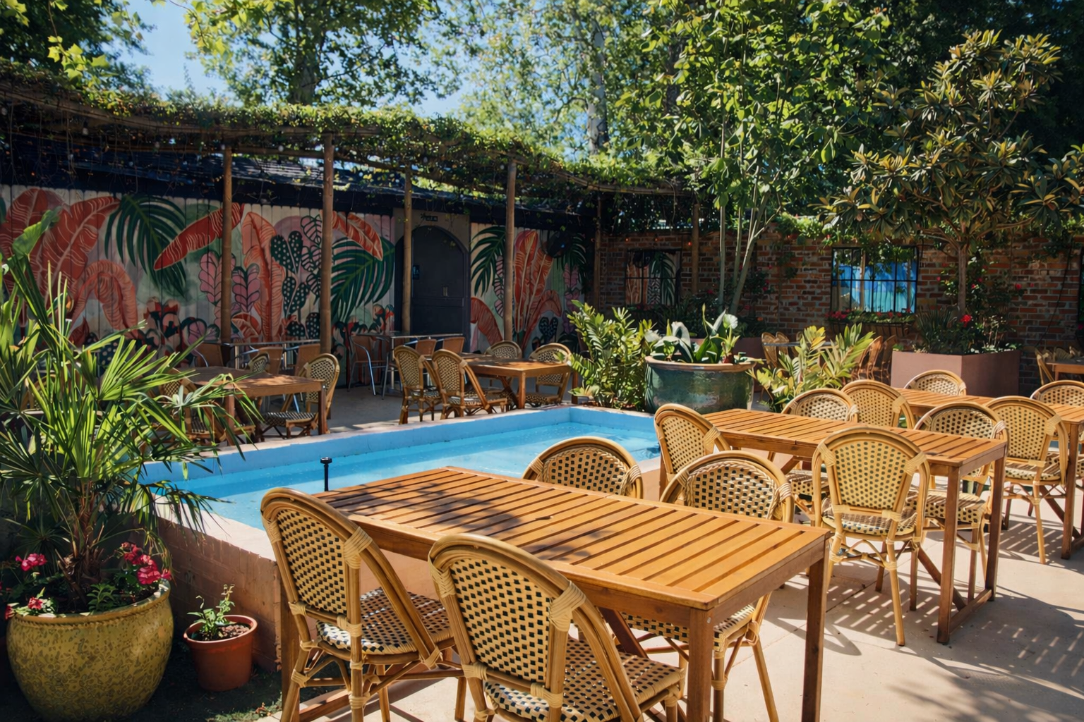 Outdoor dining by the vibrant pool (1).png