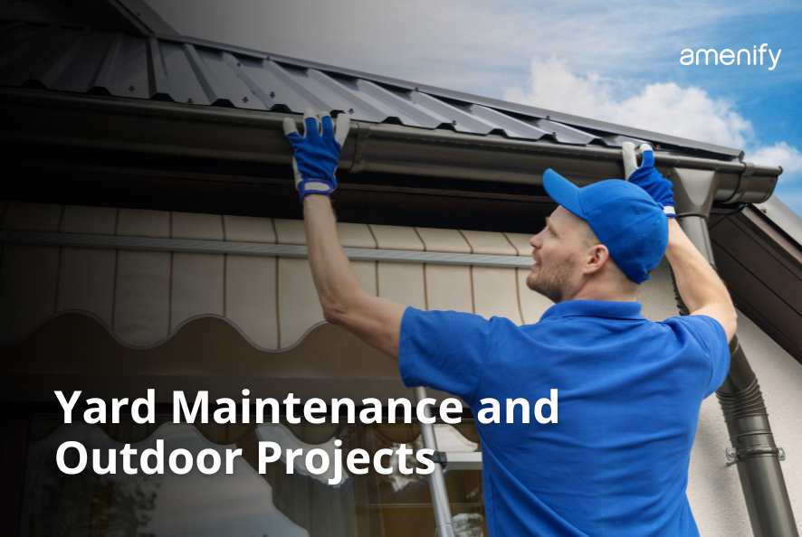 a handyman working on installing roof gutters for seasonal preprations