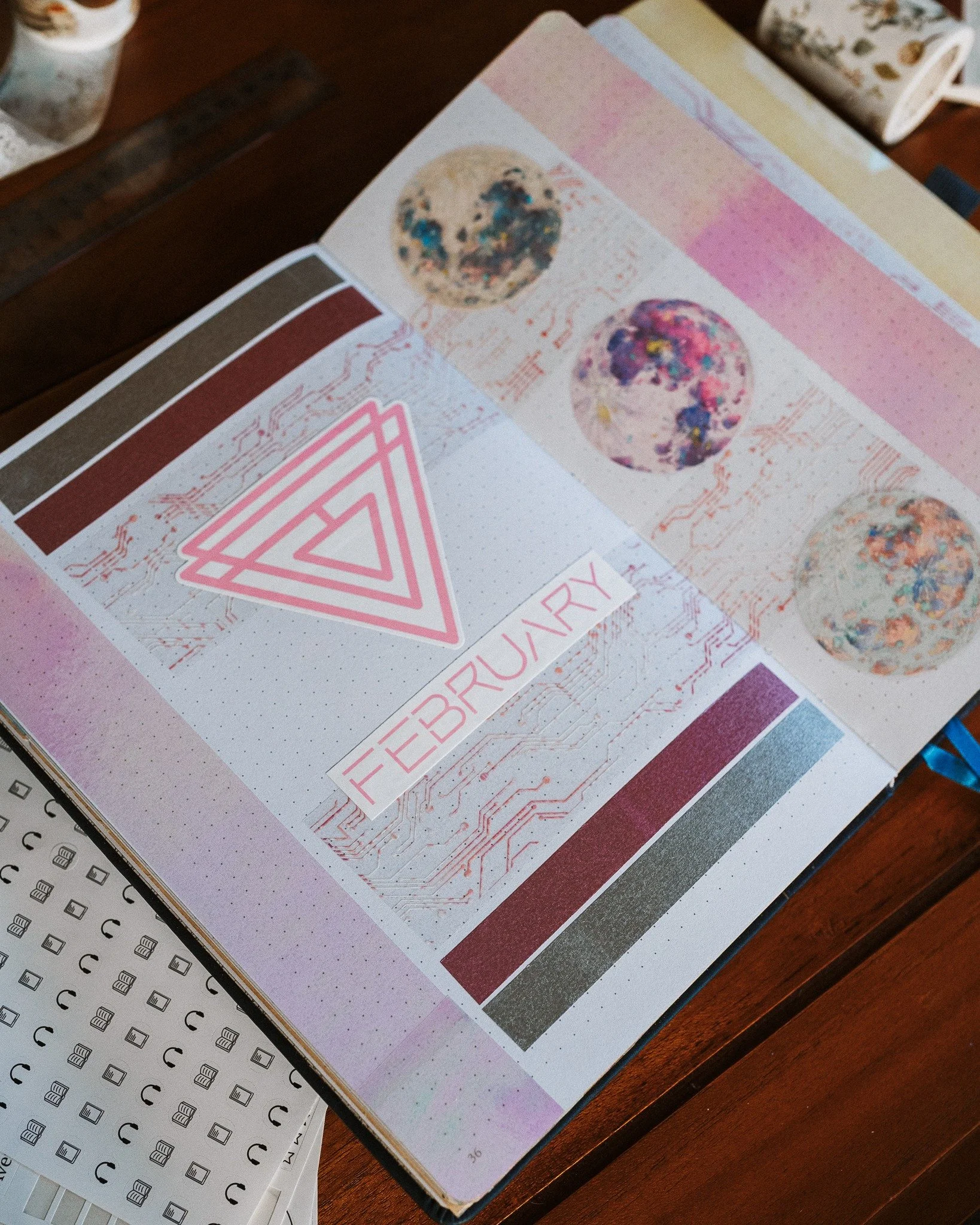 This February theme in my reading journal came about because I was out of ideas and asked my partner to choose a tape for me! He chose the circuit board tape and this sci-fi theme was born. I DIYed the header stickers with my Cricut and a font called