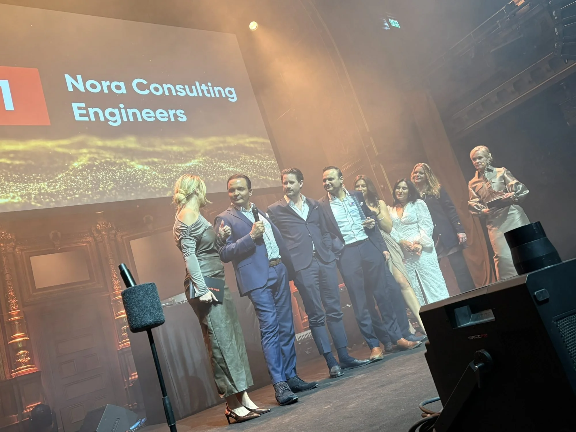 NCE-medarbetare på scen vid Great Place to Work 2026