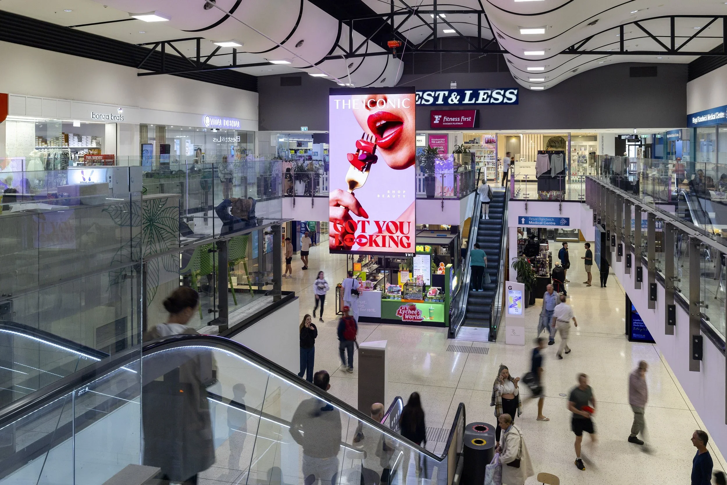 VMO_NSW_Royal+Randwick+Shopping+Centre_Location+1+-+Centre+Court++Ceiling+Mounted+Double+Unit+-+Back-to-Back+Banner____01042024-4+(1).webp