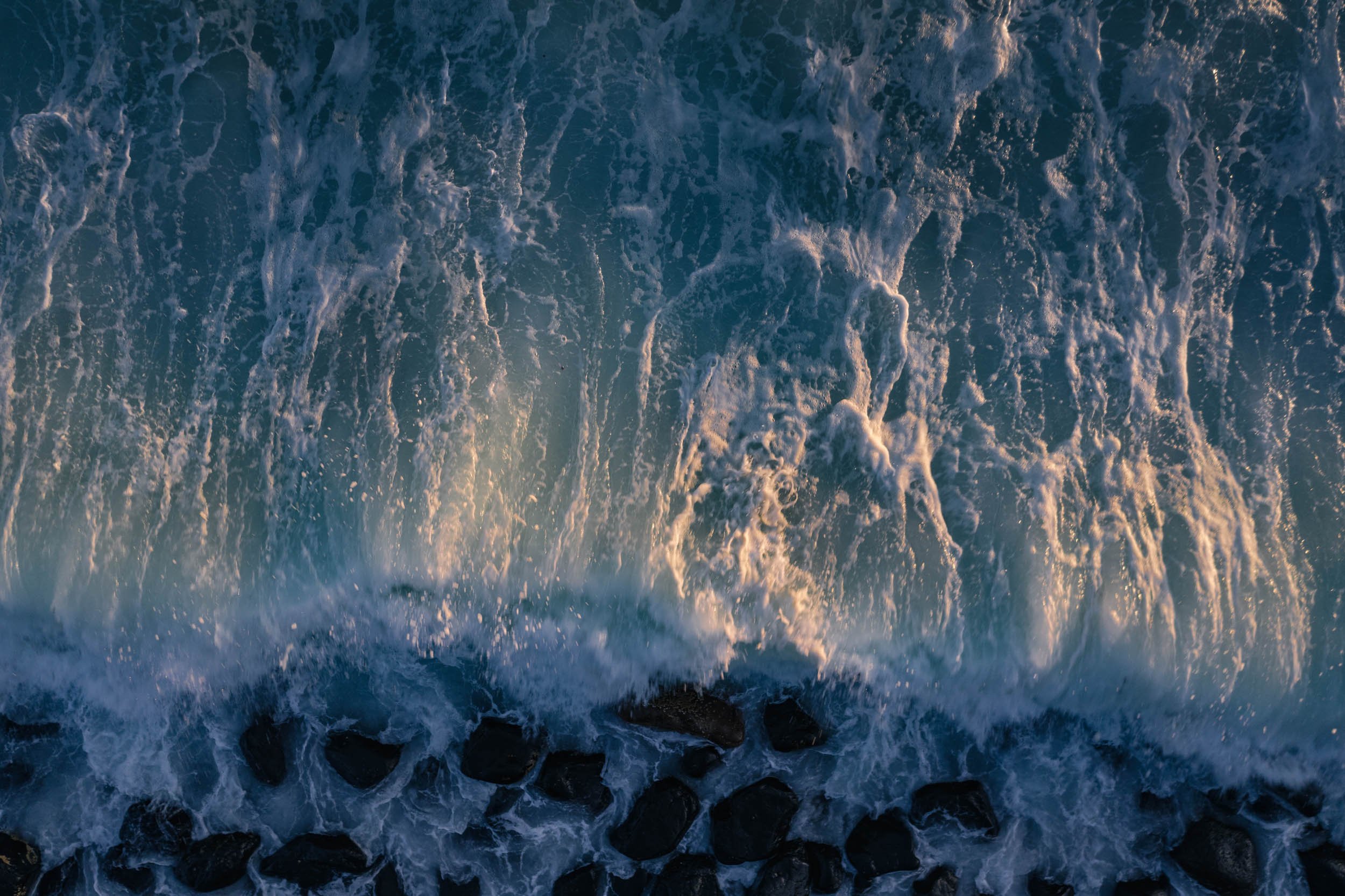 Wave breaking on headland