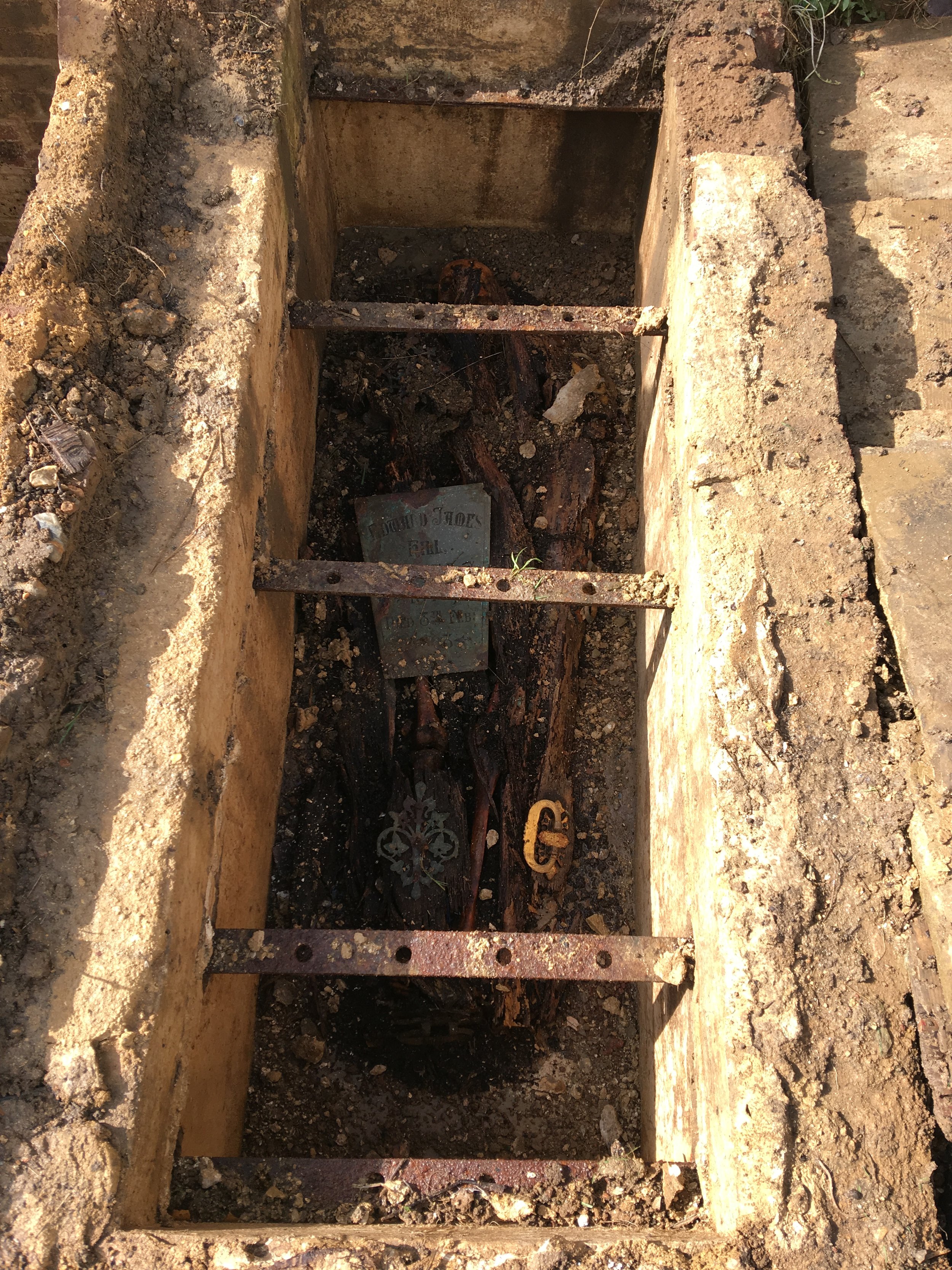 Opened vault with coffin debris