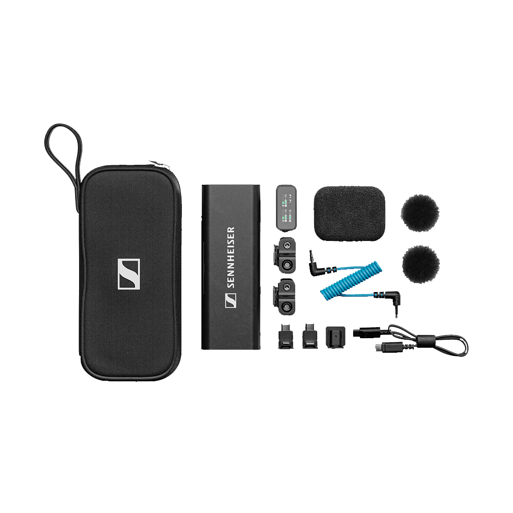 Collection of microphone accessories including a carrying case, audio interface, microphones, windshields, foam pads, mic clips, and cable ties from Sennheiser.