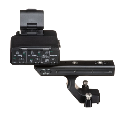 A professional camera mounted on a stabilizer rig with control buttons and a handle.