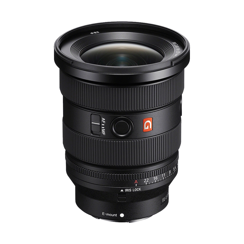 A black camera lens with various markings, buttons, and a red 'G' logo, positioned against a plain background.