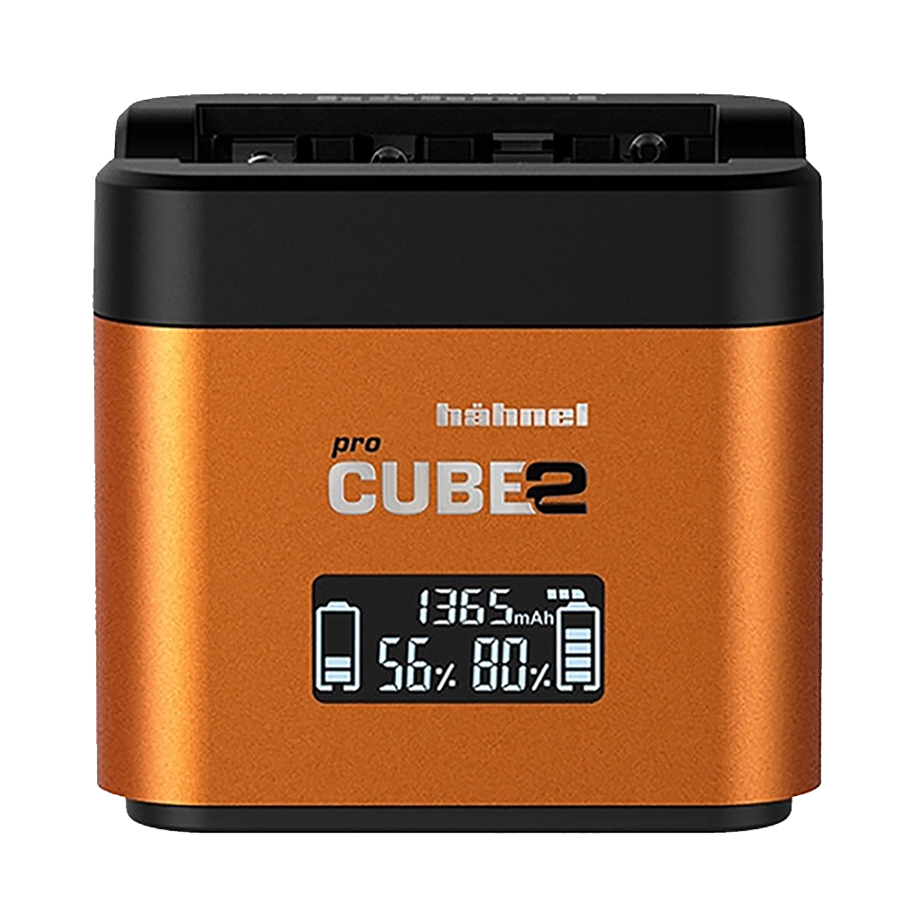 A digital camera battery charger with a display showing battery capacity and charge level, branded 'hähnel pro CUBE 2' in orange and black.