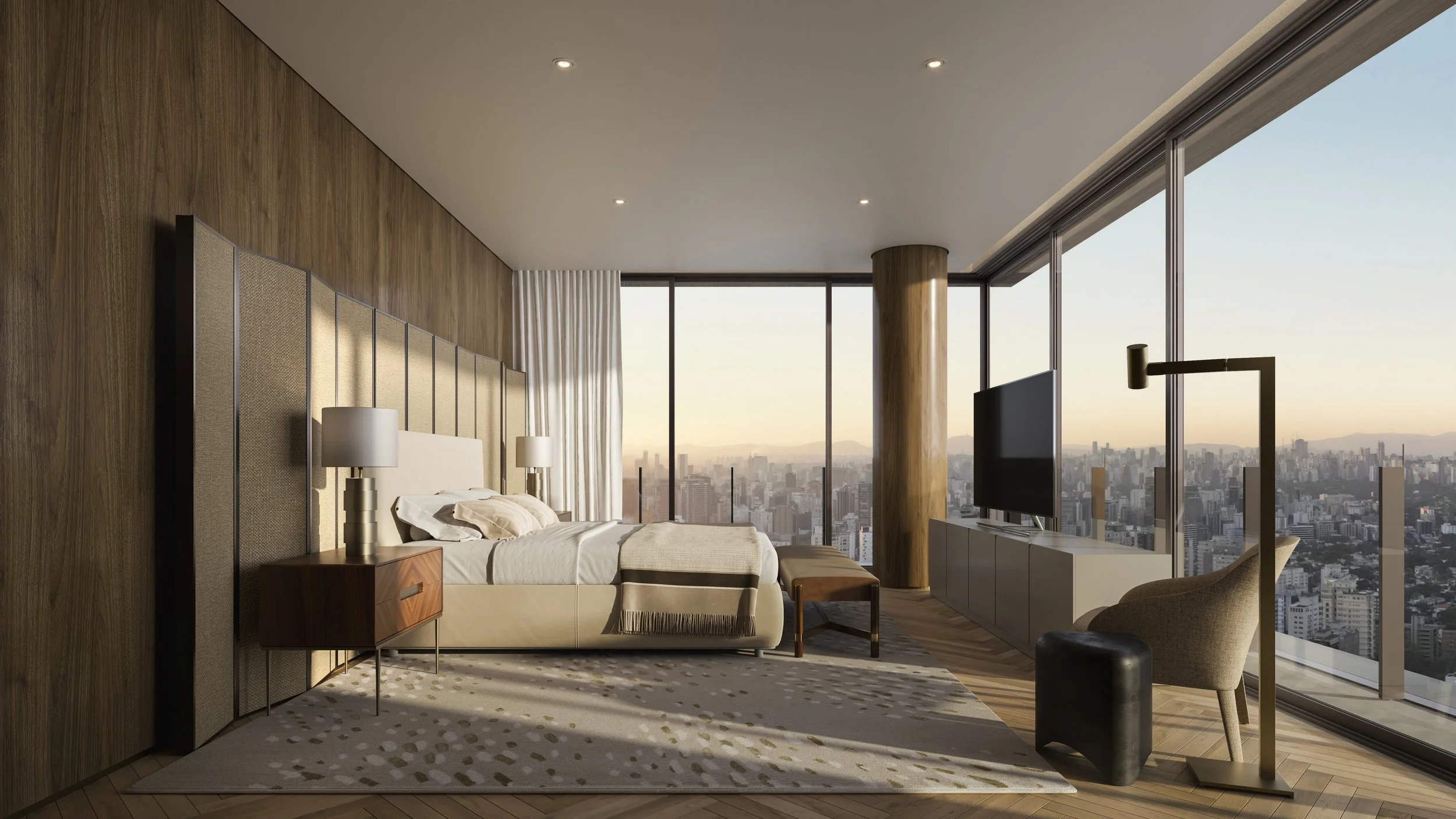 Modern bedroom with large floor-to-ceiling windows showcasing city skyline at sunset, featuring a bed with beige headboard, bedside table with lamp, TV, lounge chair, and wooden accents.