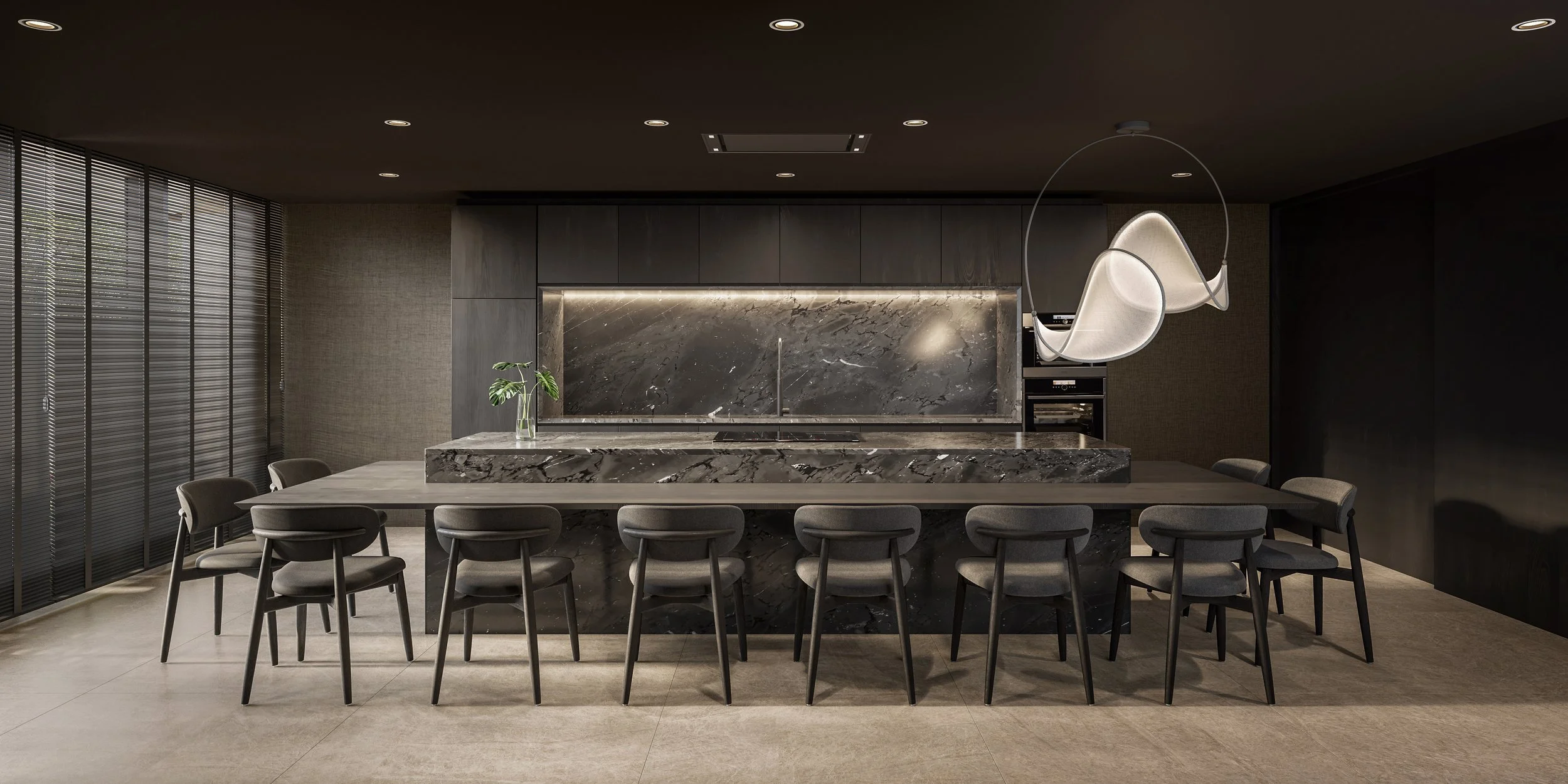 Modern dining room with a large marble table, attendance of twelve gray chairs, dark wood walls, a marble backsplash, and a contemporary sculptural pendant light.