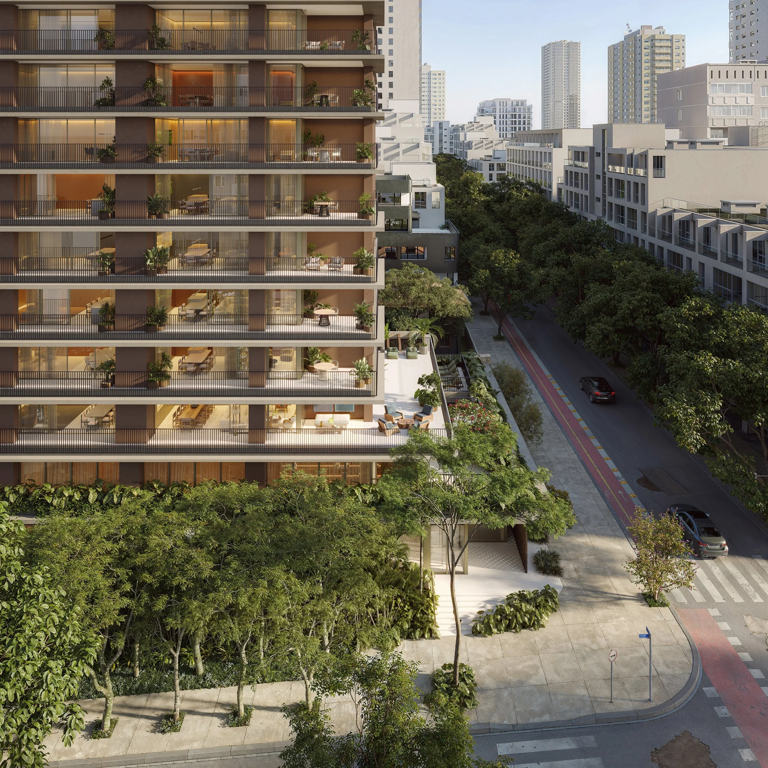 High-rise apartment building with balconies, trees, and a street with cars in an urban setting.