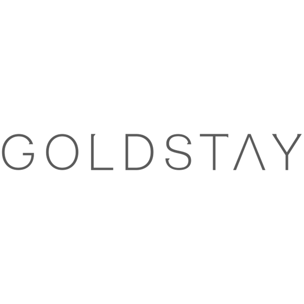 Black logo with a stylized geometric wolf's head above the word "GOLDSTAY" in gray capital letters.