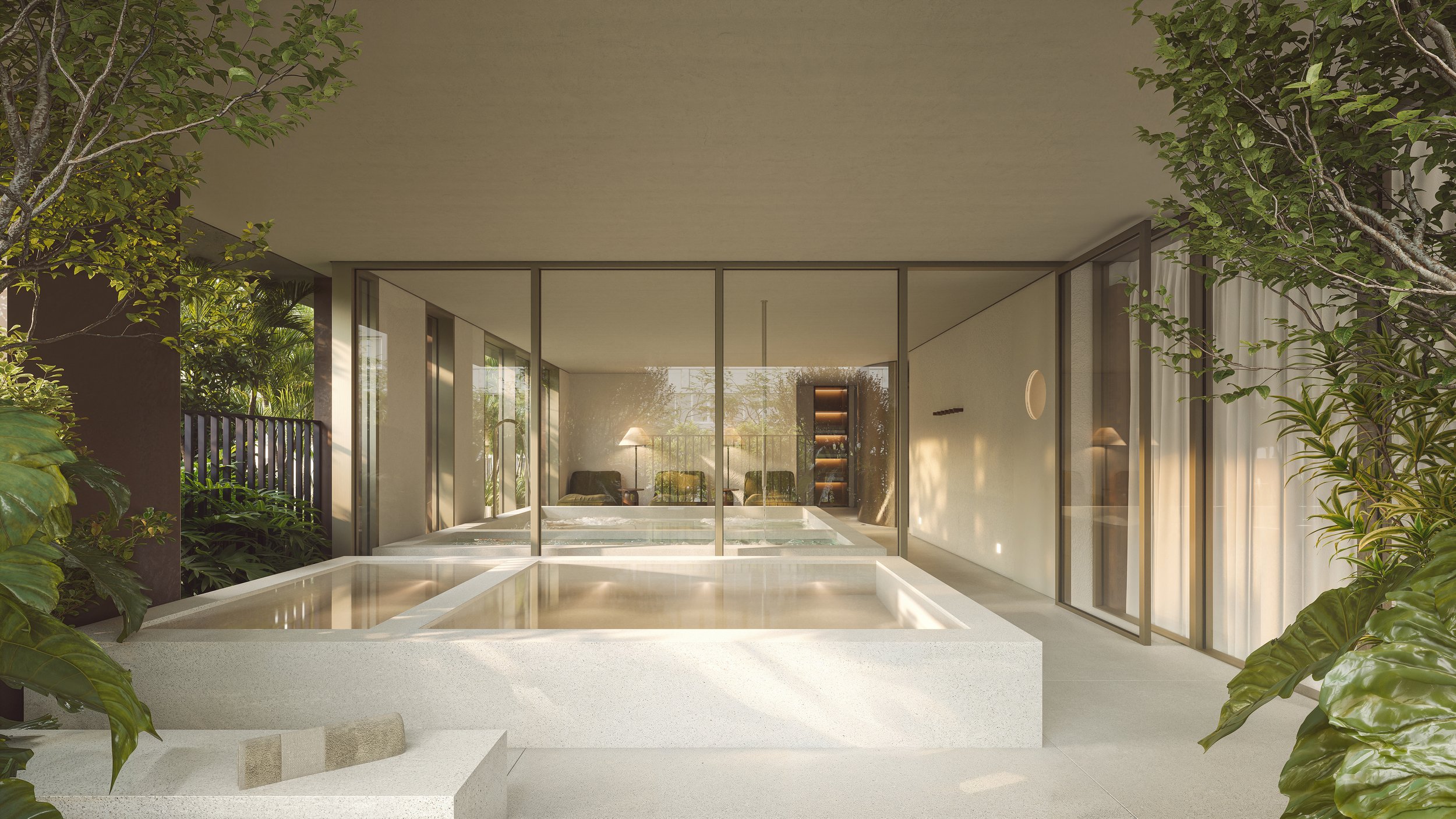 Modern indoor pool area with large glass sliding doors, surrounded by greenery, with seating and lamps visible inside.