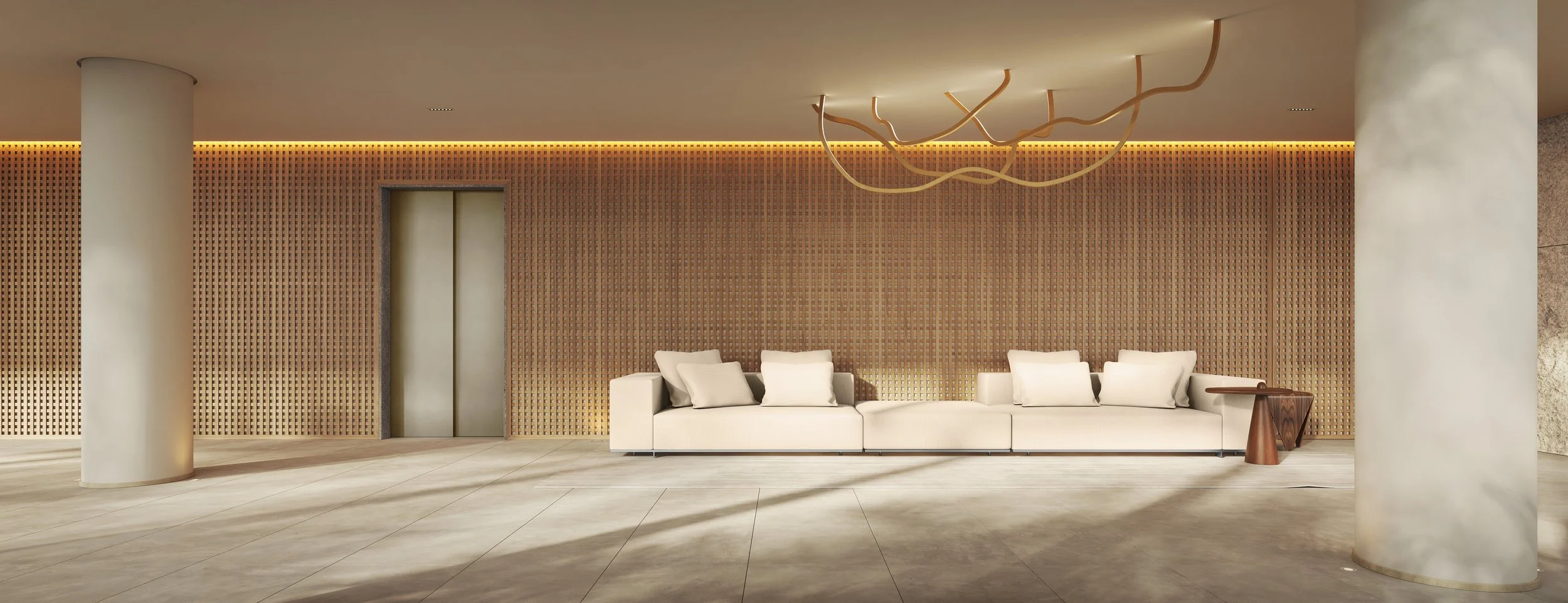Modern hotel lobby with a white sofa, beige cushions, wooden side table, textured wooden accent wall, round white pillars, and a unique wooden chandelier ceiling light fixture.