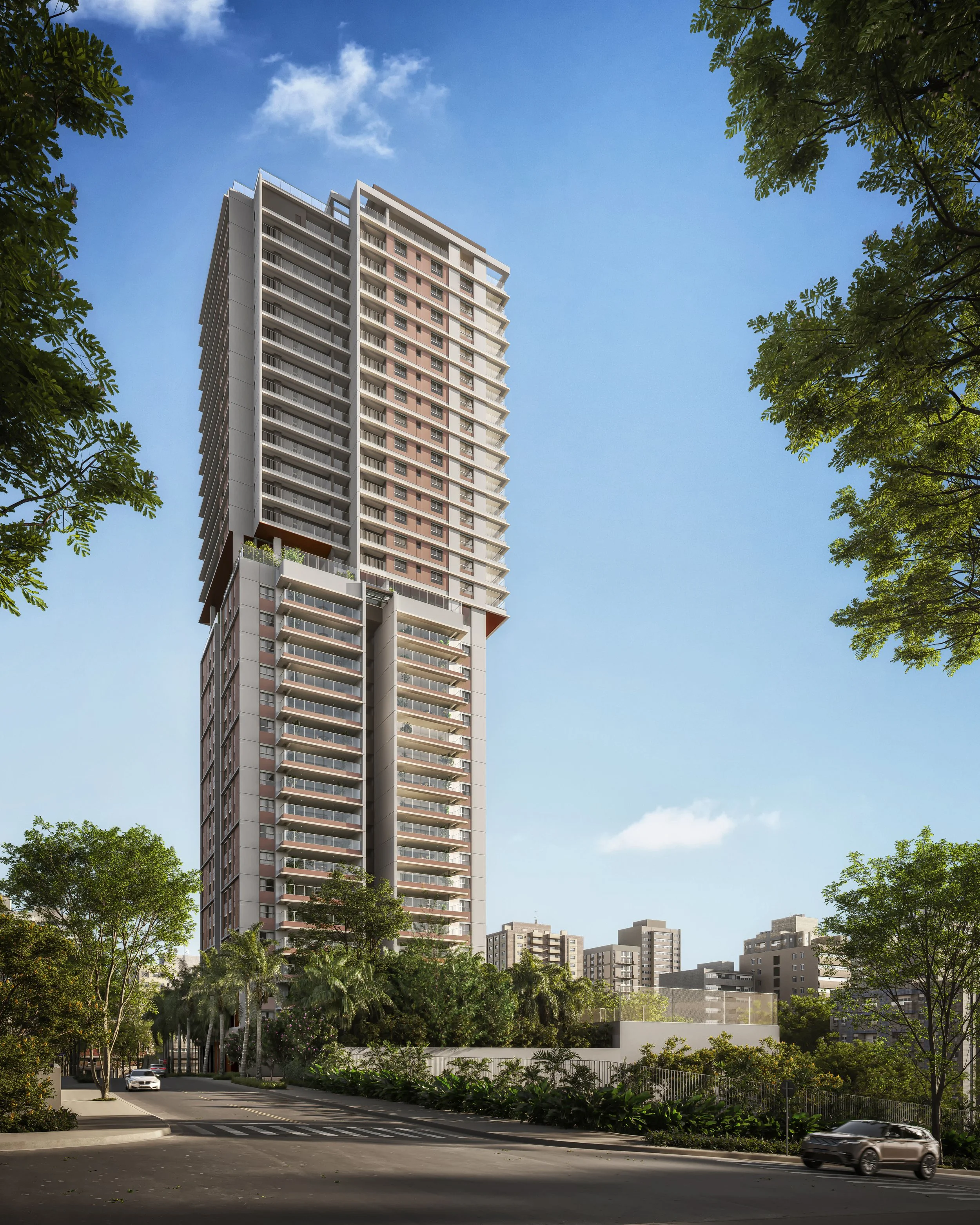 A tall modern high-rise building with multiple balconies, set against a blue sky with some clouds, surrounded by green trees and other mid-rise buildings.