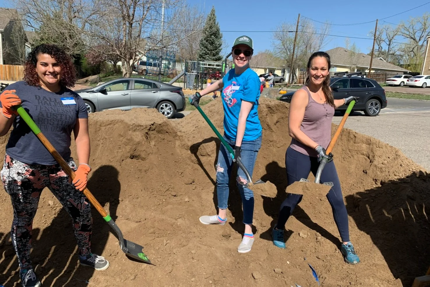 BeyondHome Volunteers doing yard work