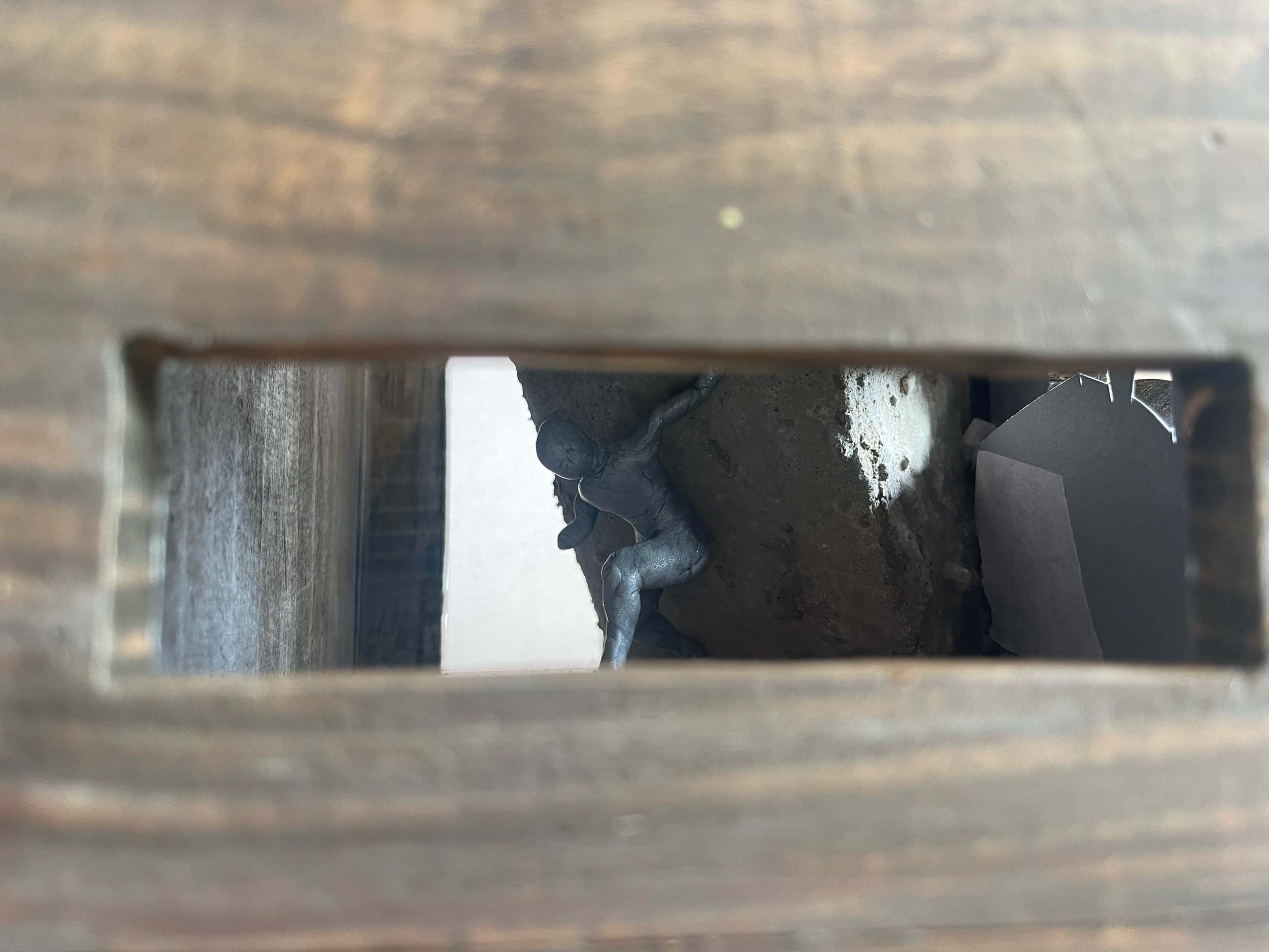 interactive-box-installation-peek-inside-figure.jpg
