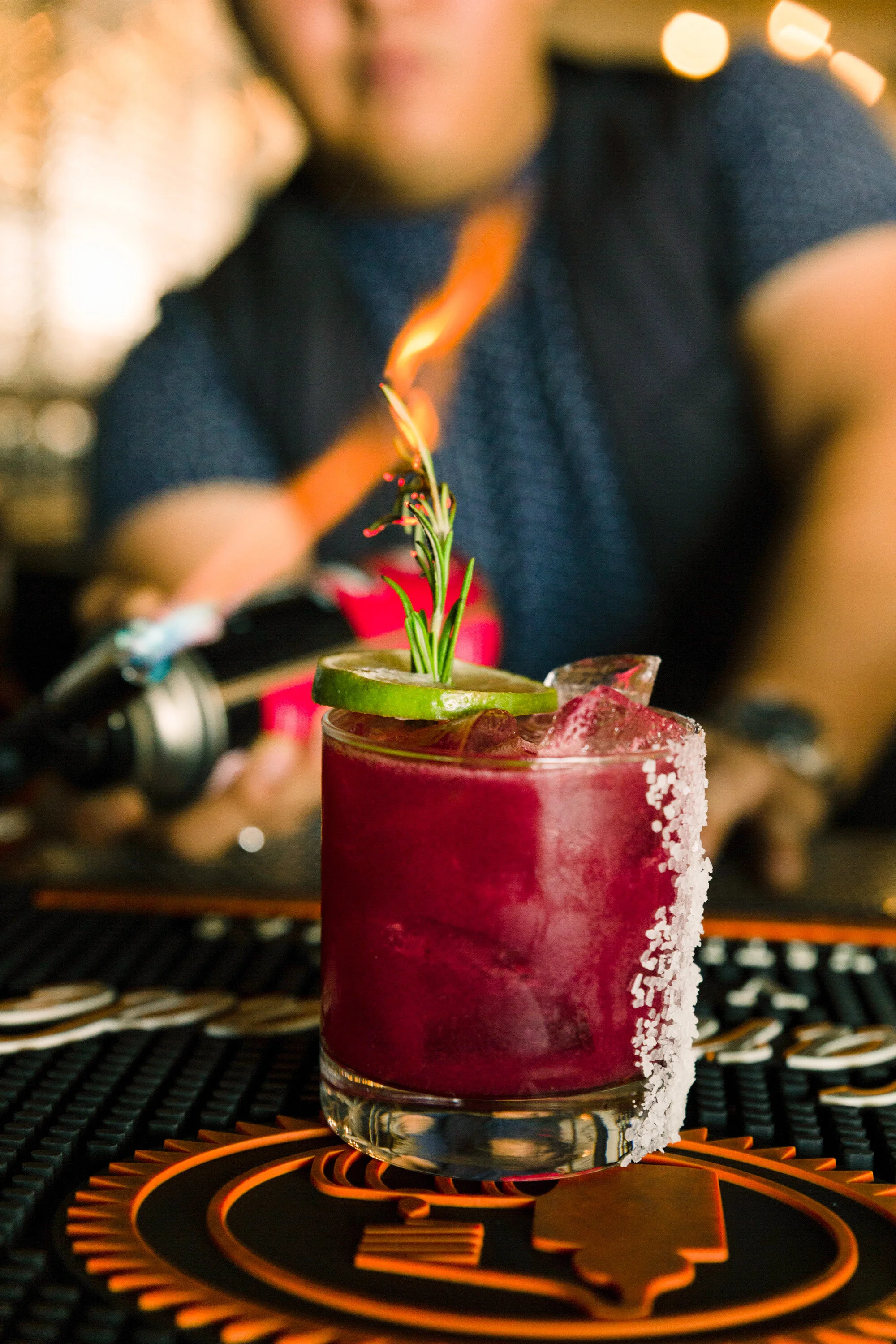 Lustful Moon Cocktail with mezcal, Japanese gin, blackberry, lemon, lime.