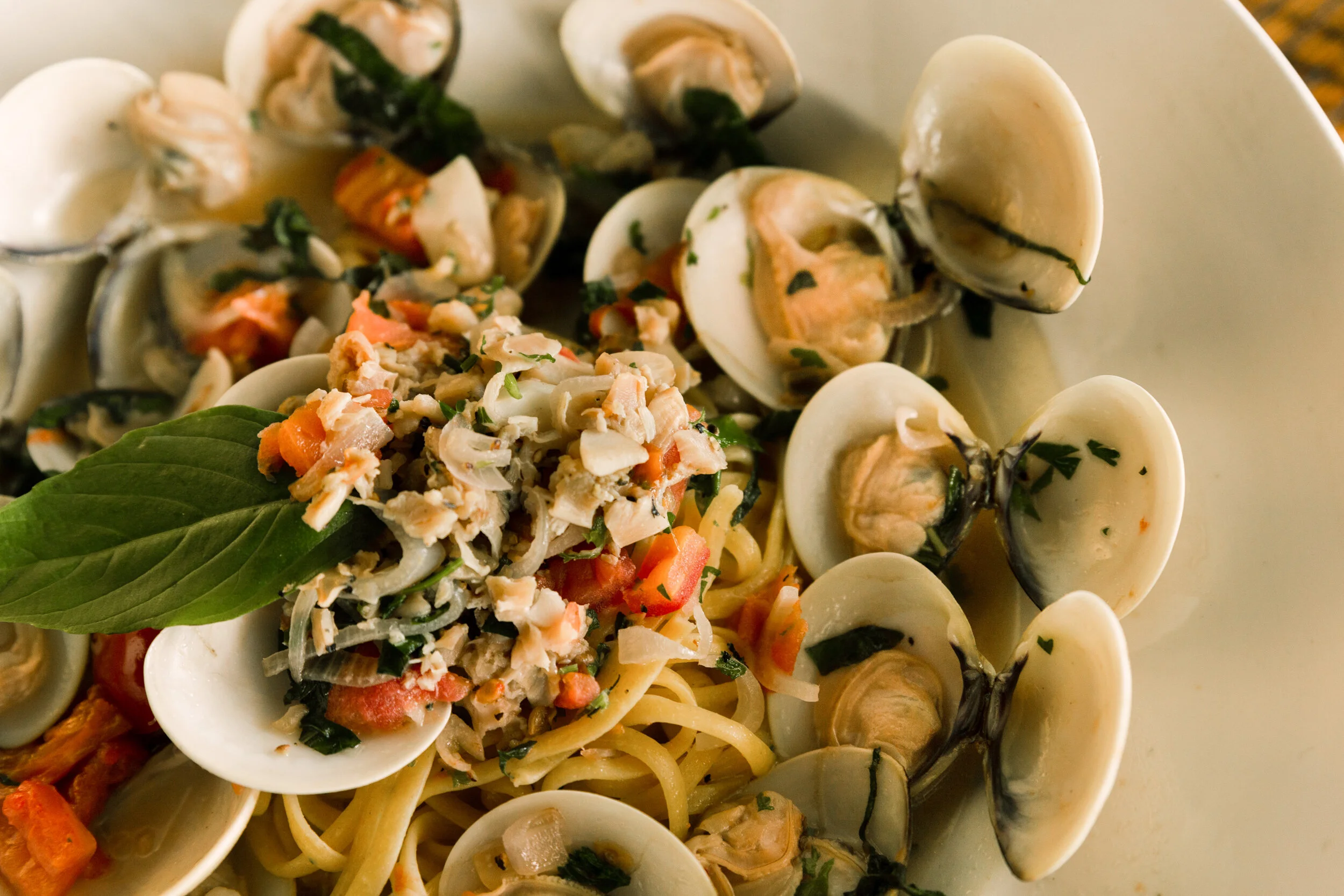 Clam Linguini, sautéed white wine, tomato, butter, and fresh garlic.
