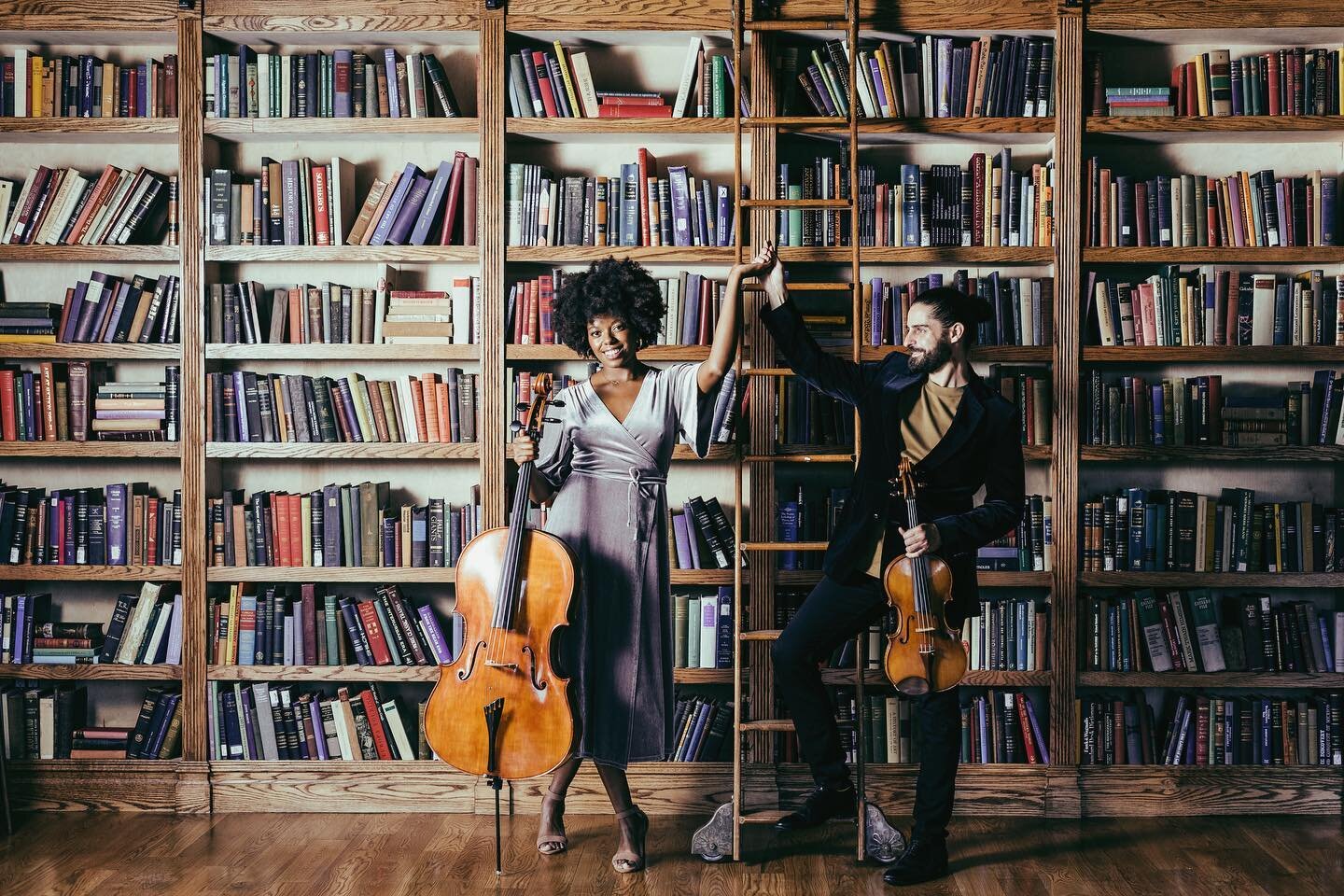 nobody puts @duokayo in the corner 😈 

peep our new website🤗- link in bio duokayo.com 

we loved shooting at @bkphotostudios ✅ highly recommend them for a variety of beautiful and varied spaces 

#violacelloduo #duomusic #musiciansofinstagram #musi