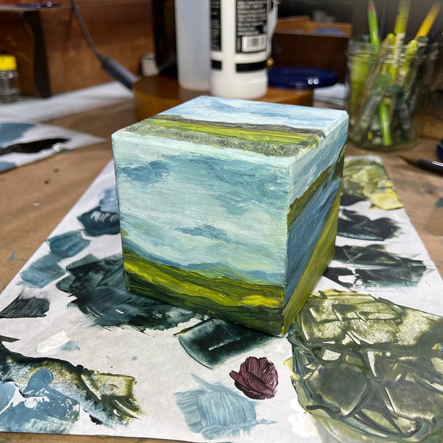 While waiting for an area on the large painting to dry you sometimes grab what is handy.  With your studio above your woodworking spouse there are always chunks of wood available.  #paintingobsession #paintingcube #cubeart