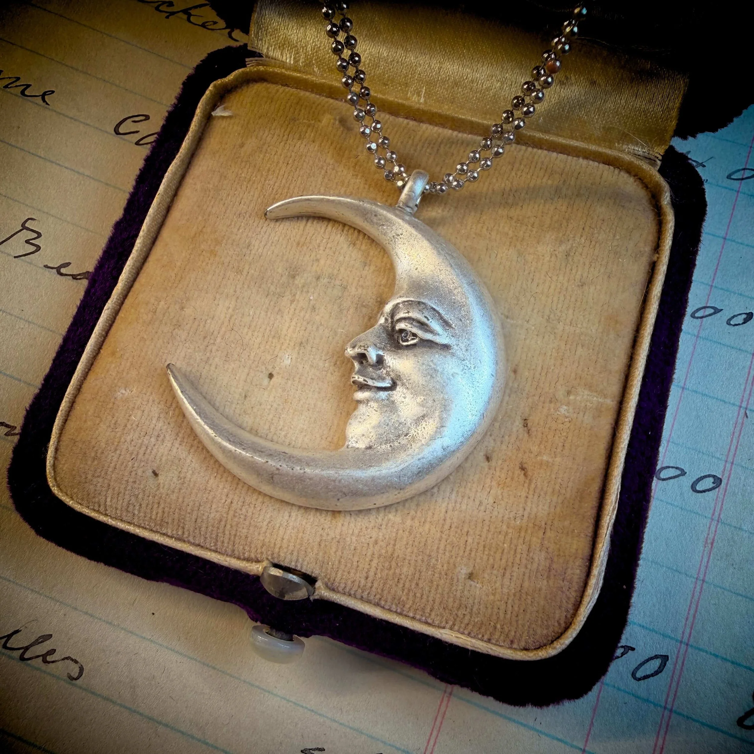 vintage-style-silver-man-in-the-moon-necklace-reflection 8.jpg