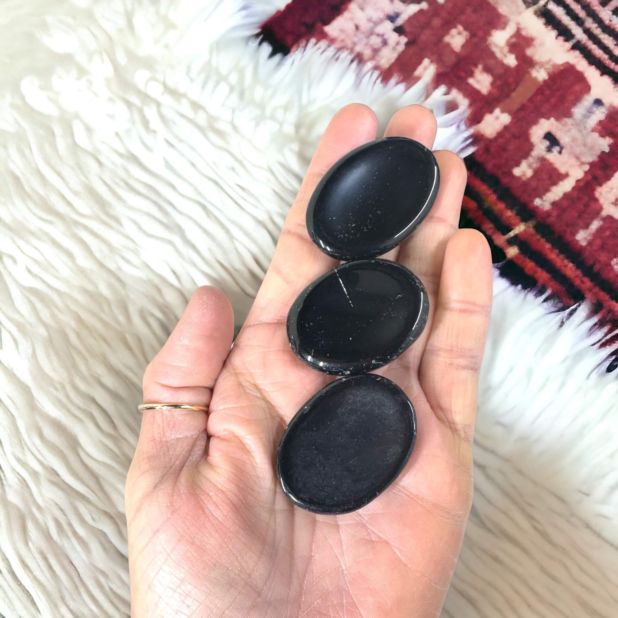 black obsidian worry stone 1.jpeg