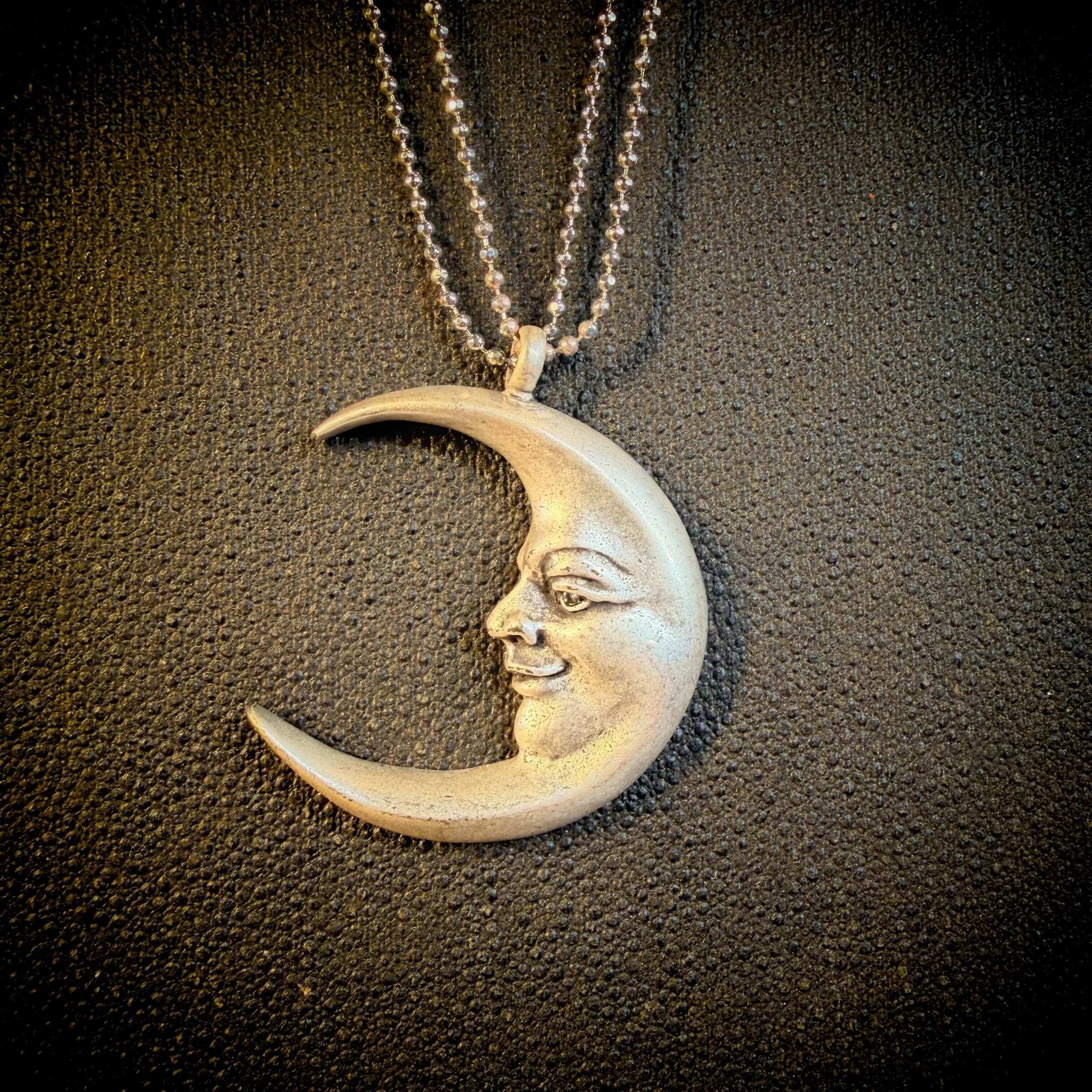 vintage-style-silver-man-in-the-moon-necklace-reflection 12.jpg