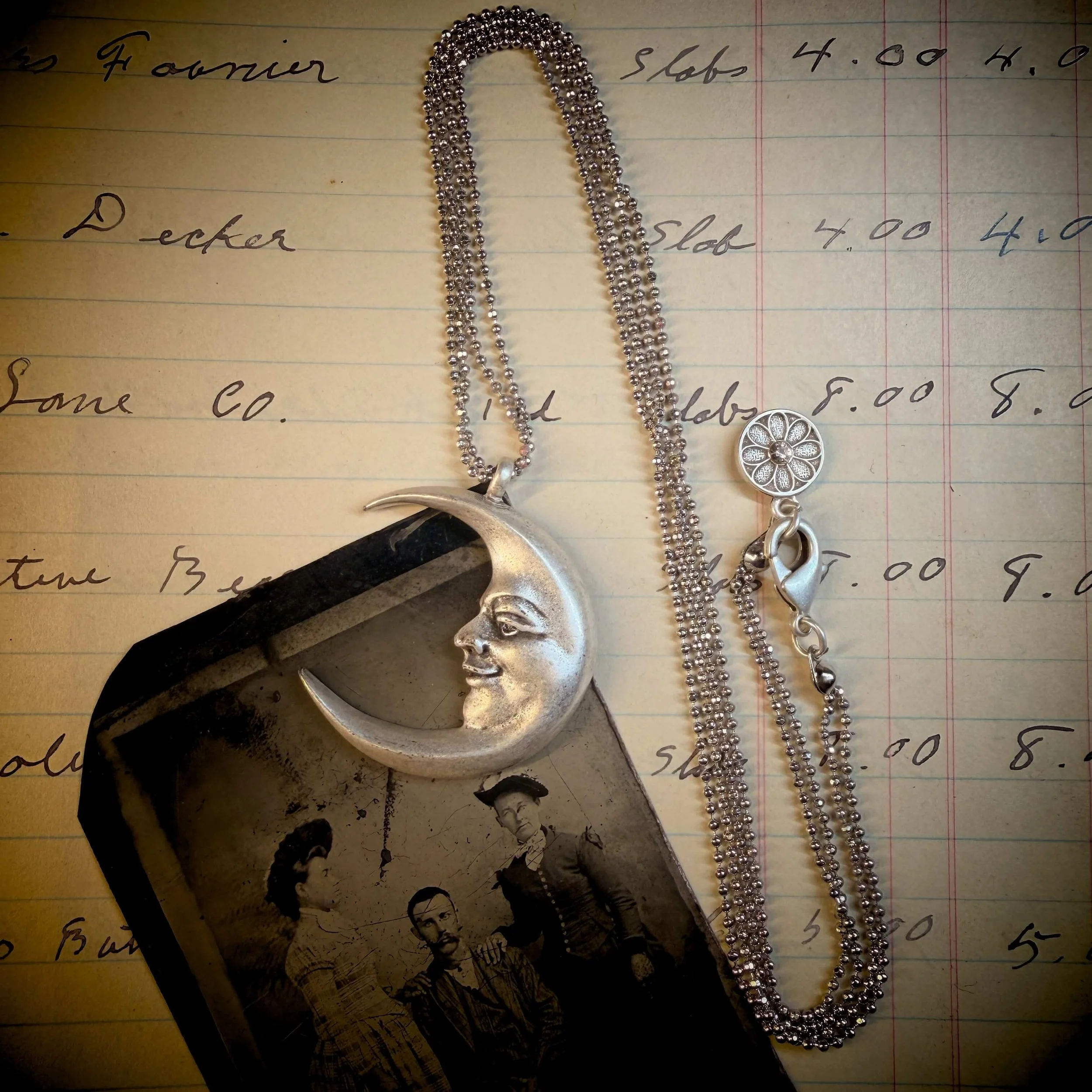 vintage-style-silver-man-in-the-moon-necklace-reflection 7.jpg