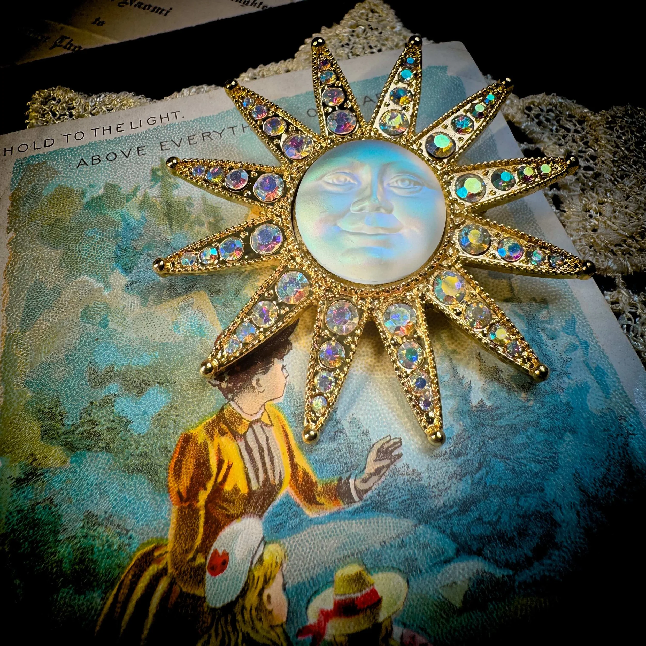 Celestial Sun Face Brooch – Gold Rhinestone Statement Pin