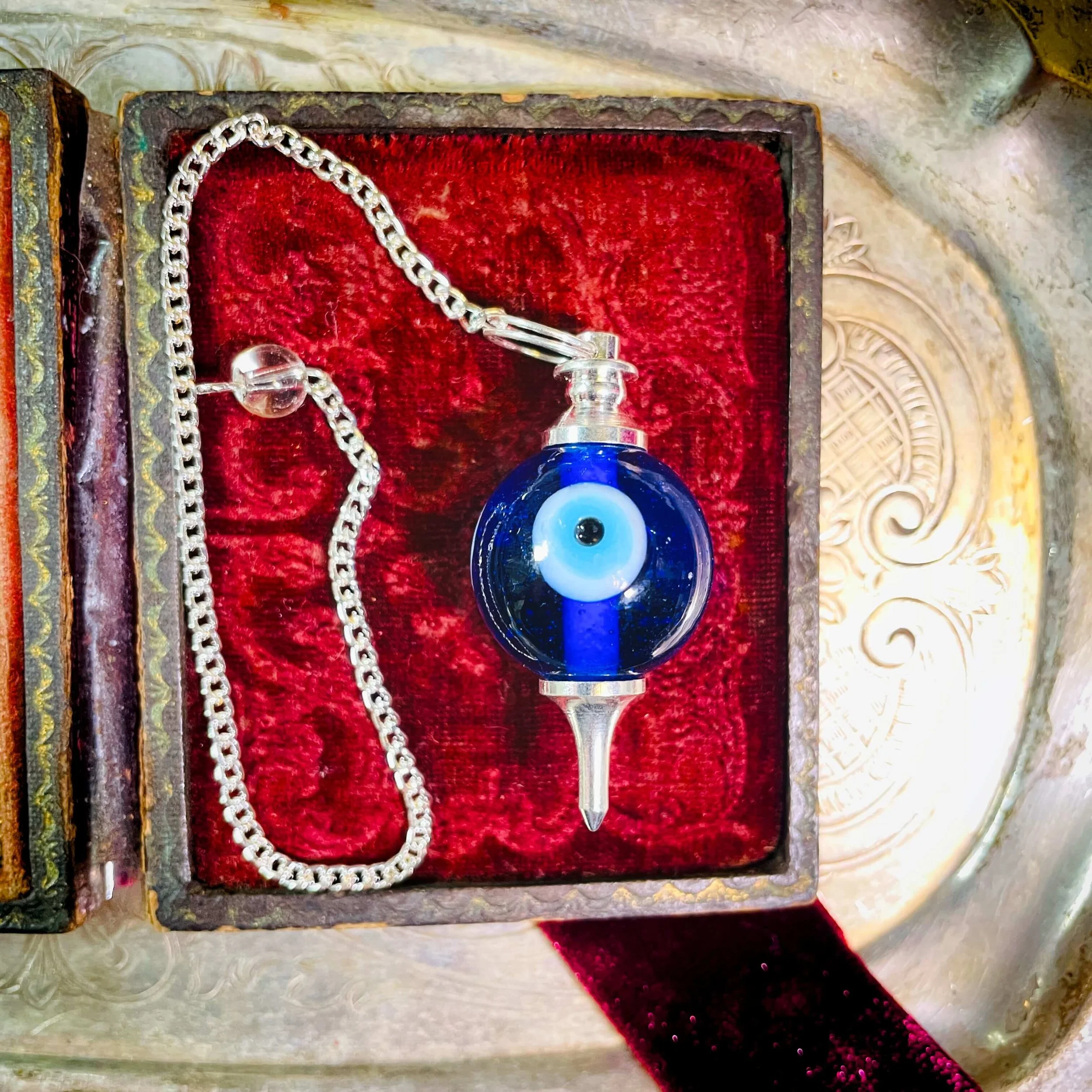 Evil Eye Pendulum For When You’re Done Guessing