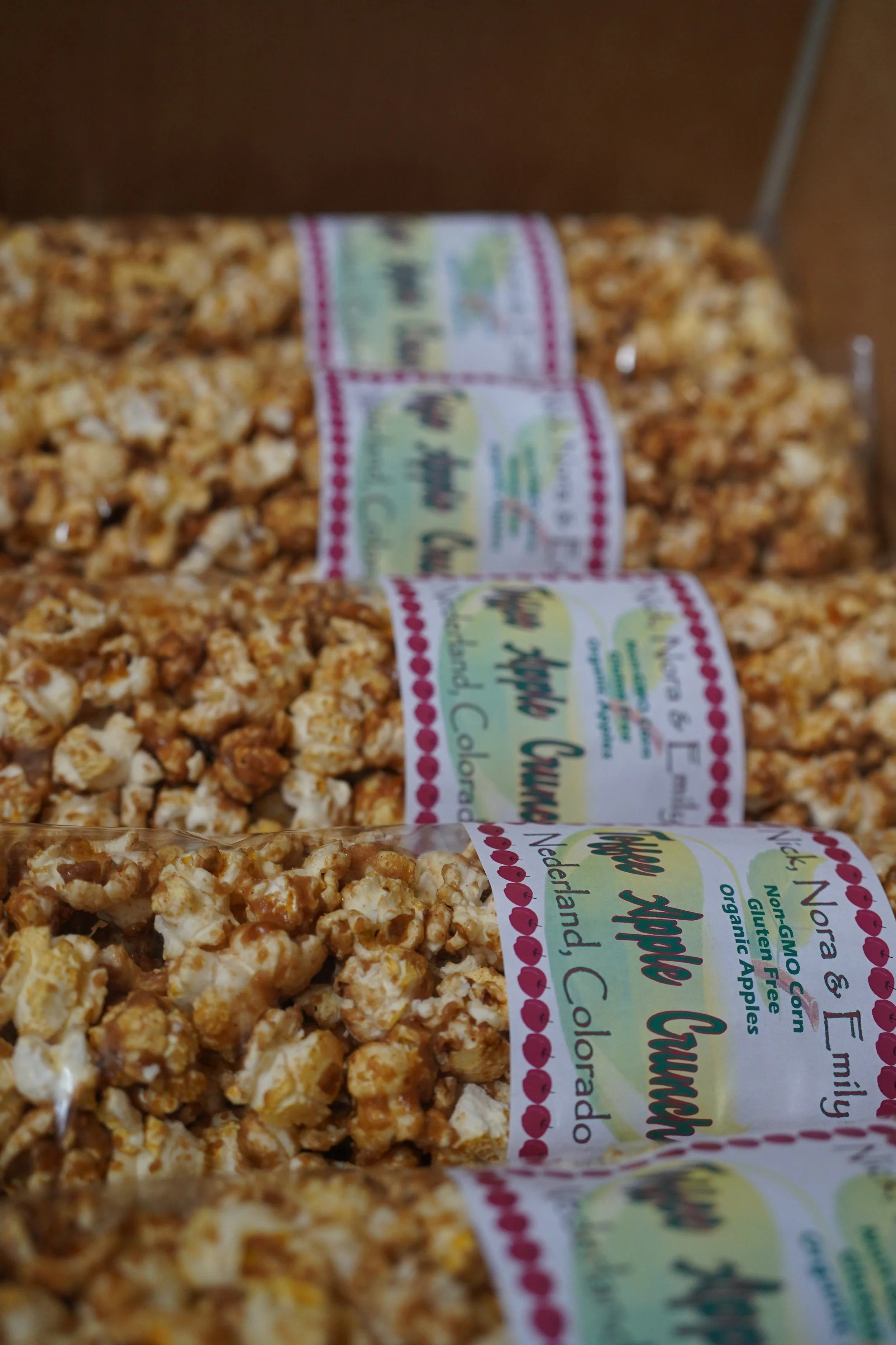 Toffee Apple Crunch bags in a line