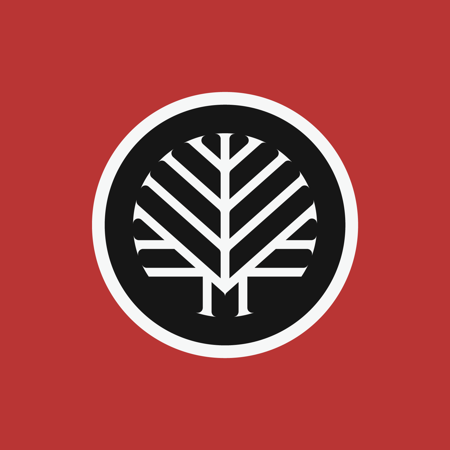 A red background with a black and white circular emblem featuring a stylized tree design.
