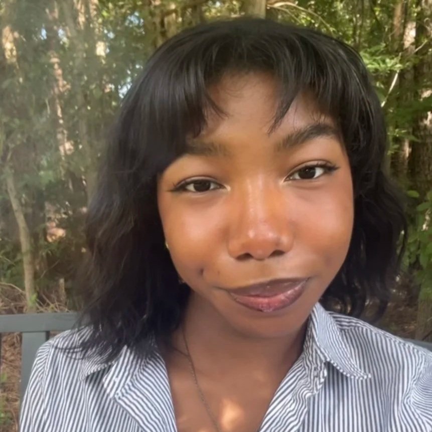 Kiara similing at camera