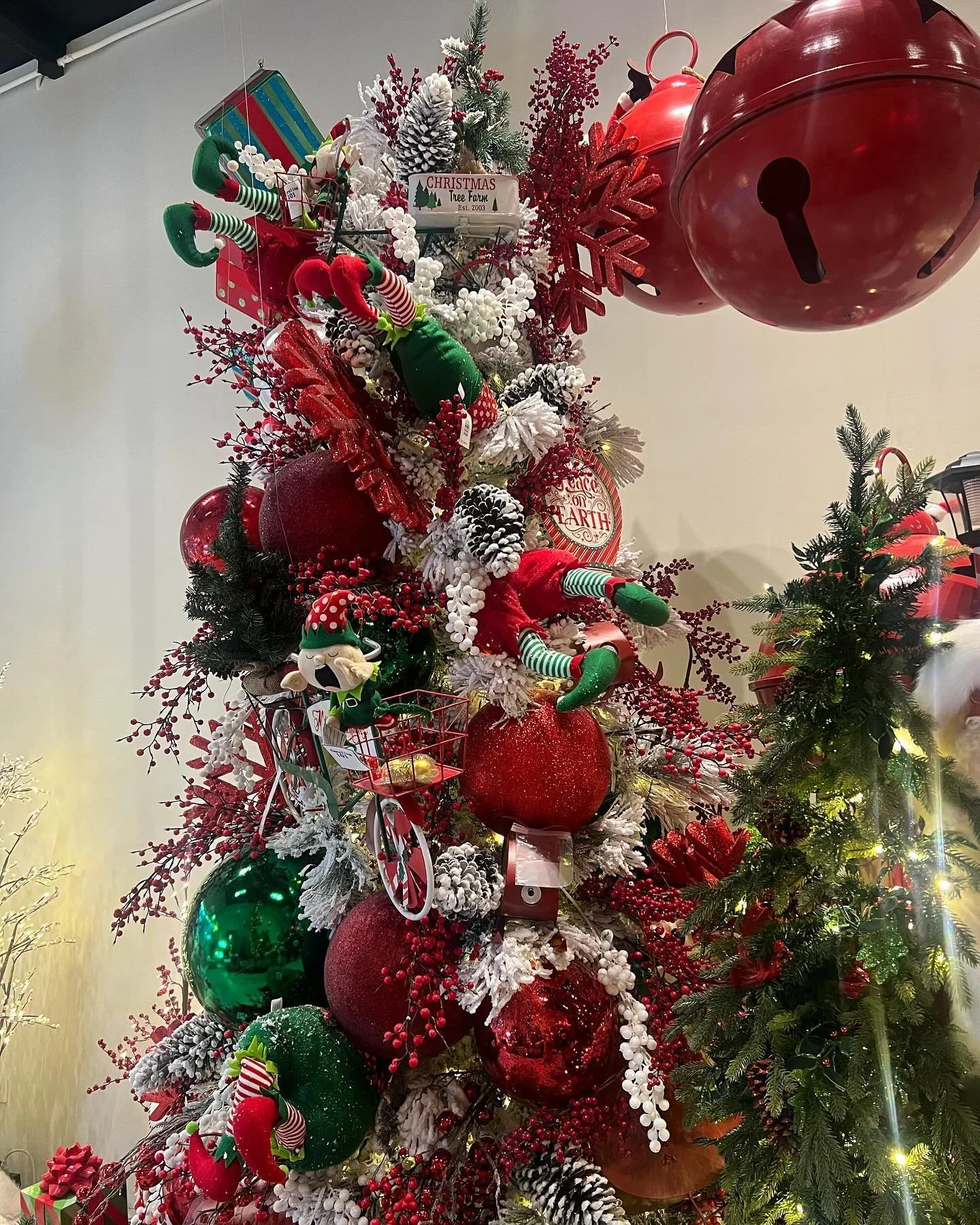 Bring the joy of the season to life with our fun and festive Christmas tree designs! 🎄✨ With playful elves and bold red, green, and white decorations, this tree is perfect for creating a magical holiday vibe for the whole family.

Let us make your h