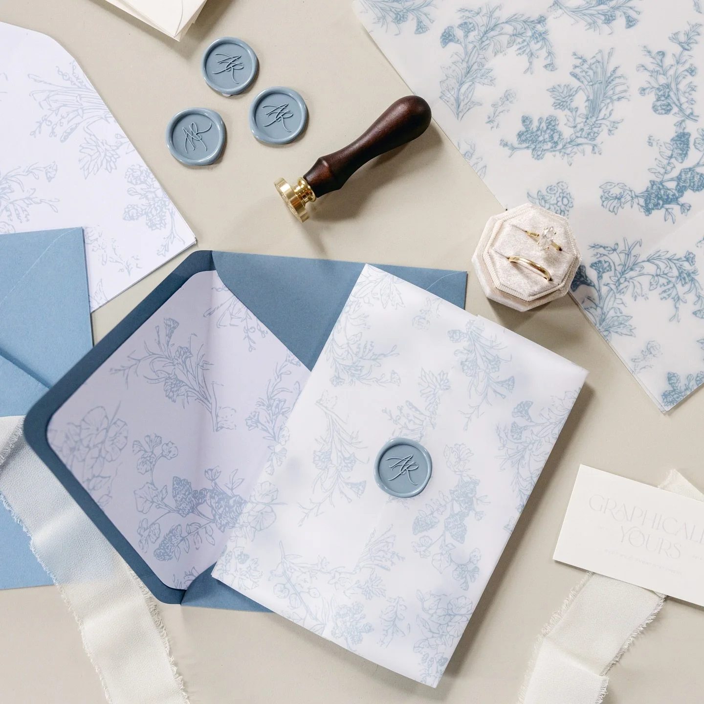 Something blue&hellip;and Bridgerton inspired🩵💙

Photo by @laurenweiler.photo @mywolfdesign 

#weddingday #weddingstationery #weddinginvitations #custominvitations #elegantinvitations #letterpress #vellumwraps #waxseals #summerwedding #printdesign 