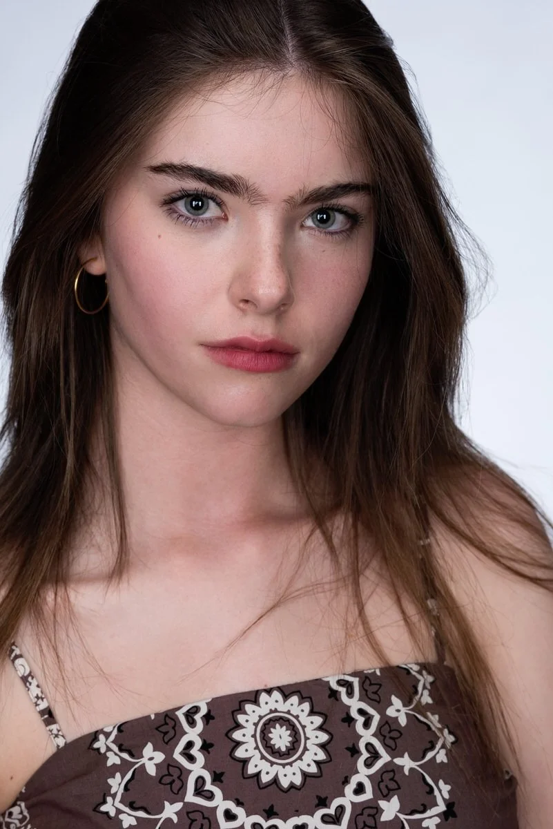 Toronto actor headshot suitable for talent agency submission — clean background, direct eye contact