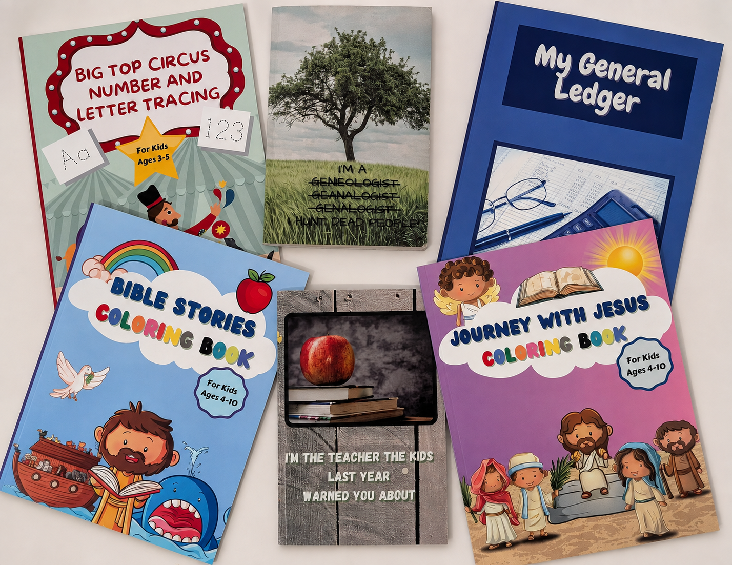 A selection of Sunset Creative Publishing coloring books, notebooks, and logbooks arranged on a table.