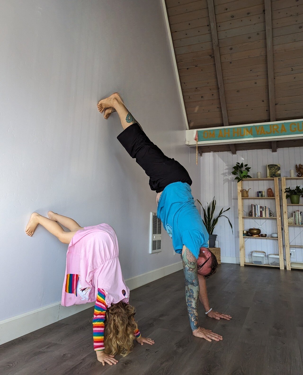Teaching Handstands to little our little one. She's getting it :)