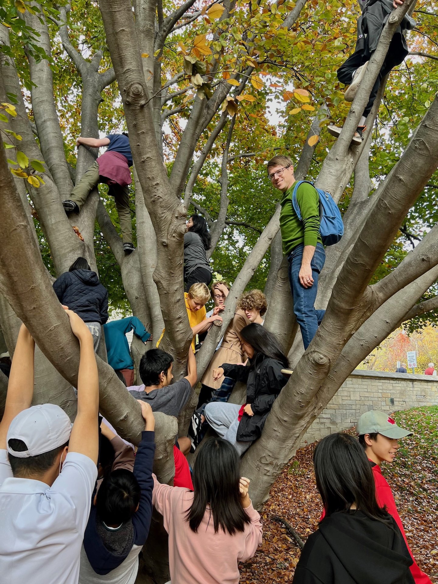 Todd with a class of students on a tree walk.