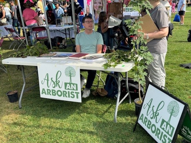 Answering resident questions at the Long Branch Tree Festival.