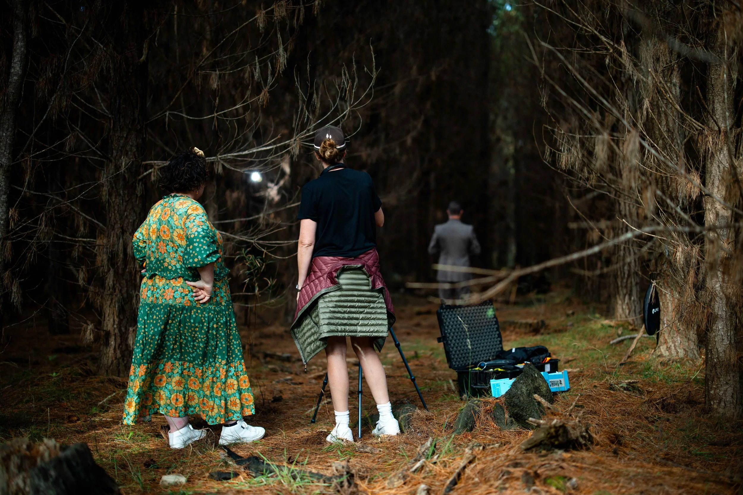 Stef Hanson on location directing still photography capture, showcasing her expertise in coordinating outdoor shoot environments.