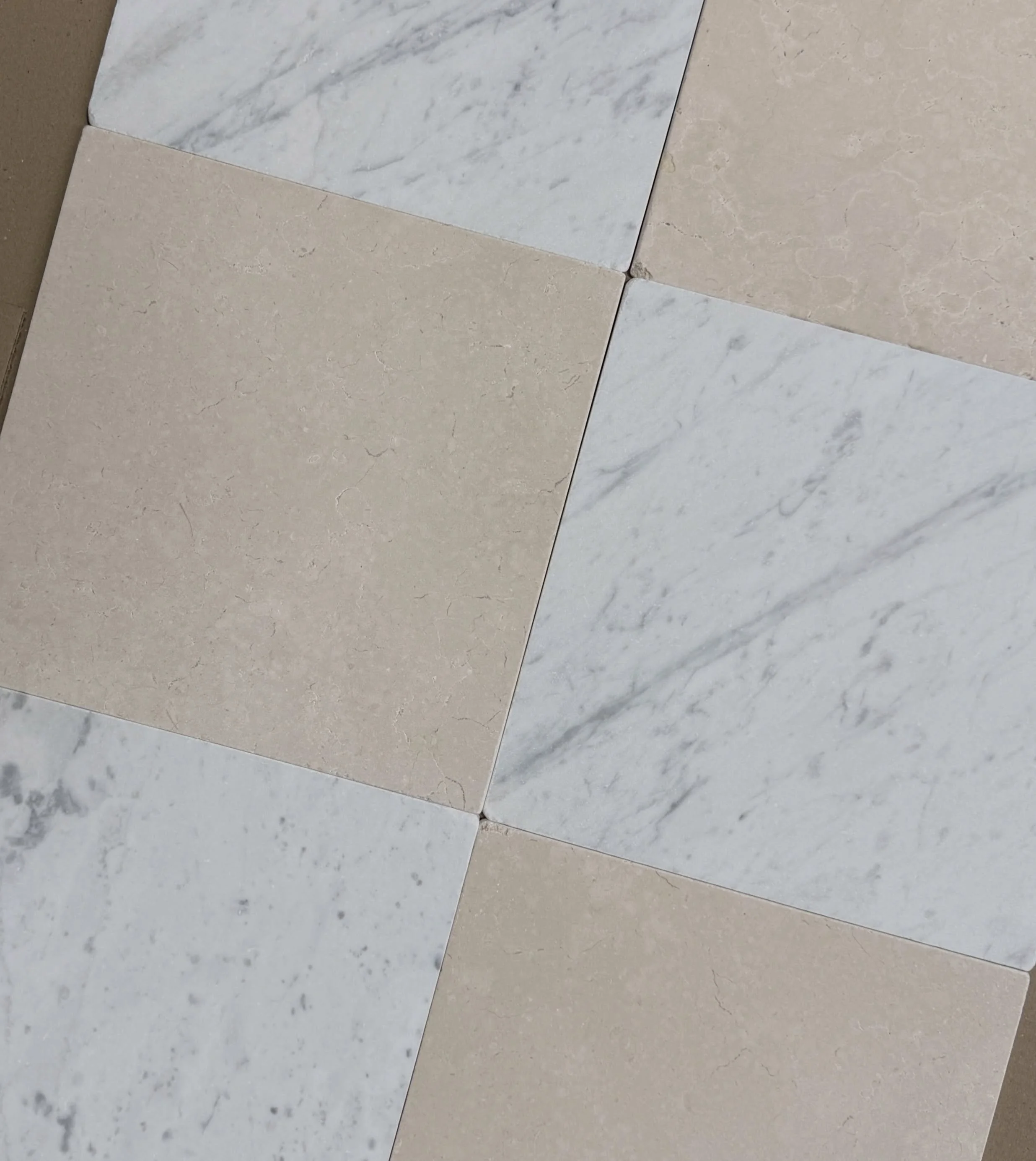 Dry laying our tumbled Carrara and Creama 305x305mm 🤍