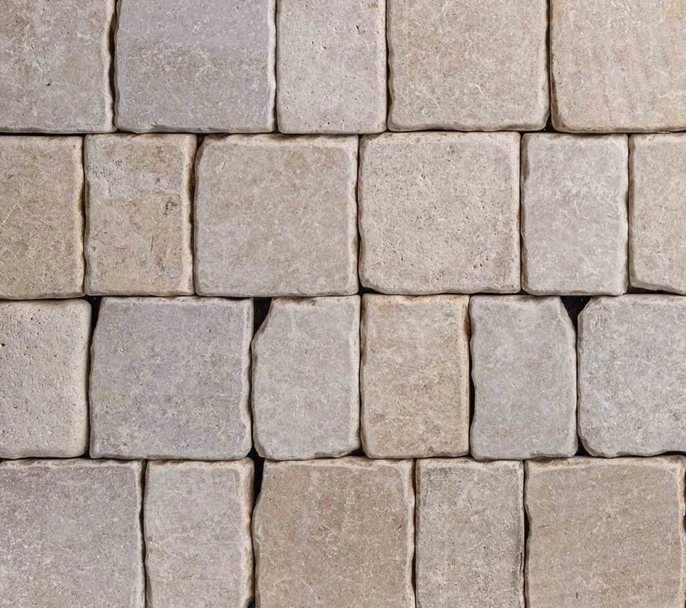 ST1G118/COB LAVINIA AGED LIMESTONE COBBLES 100-150X150X20MM