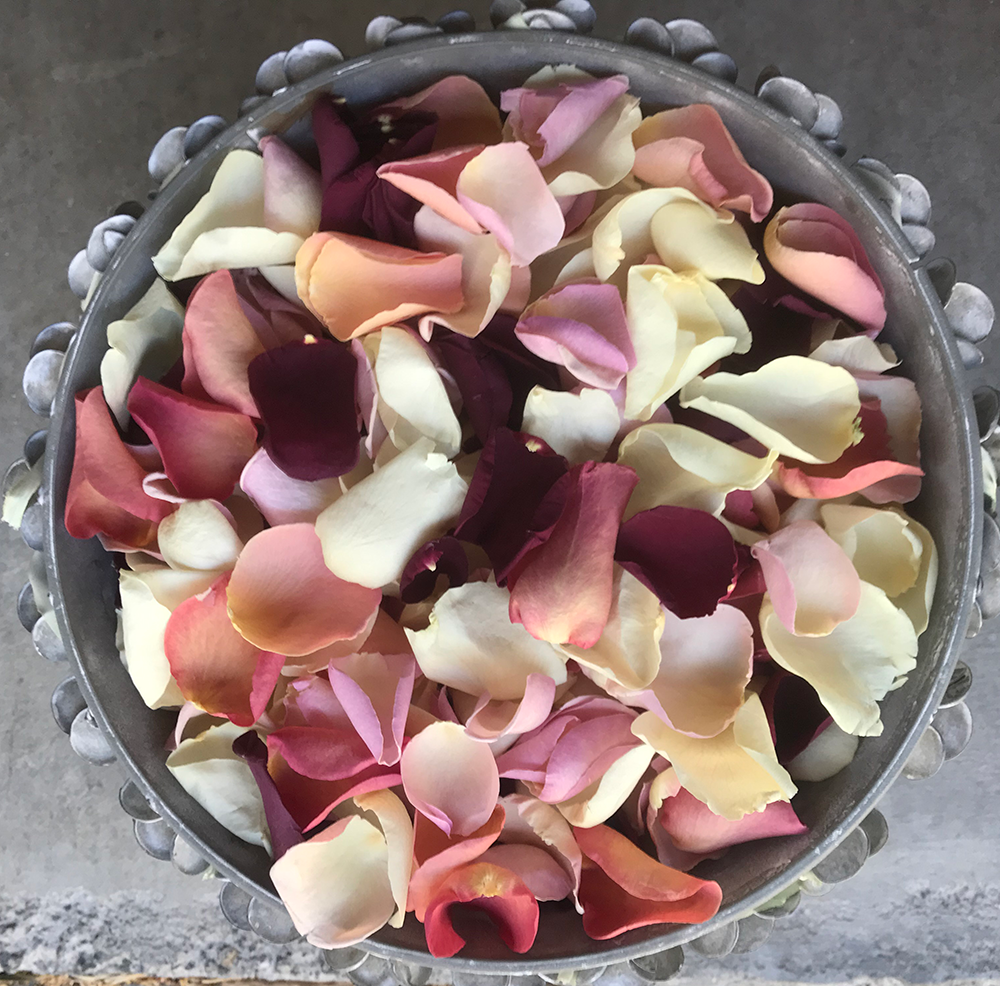 An arrangement of eco-friendly, non-wilting, freeze-dried seasons forage colour rose petals.