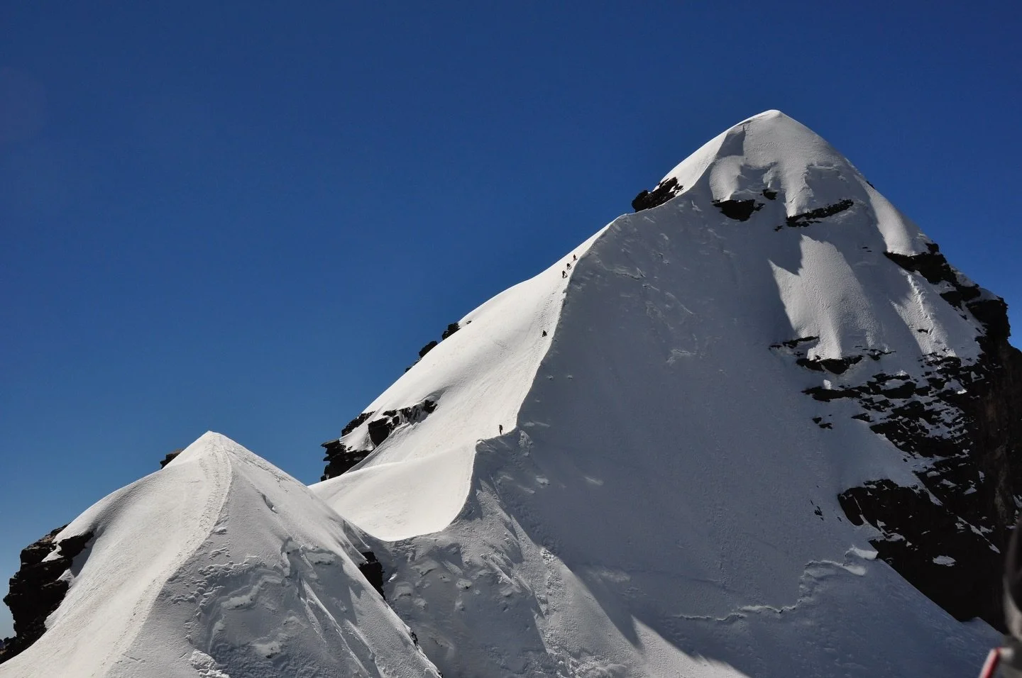 I was barely out of my teens the first time I got the incredible opportunity to start high altitude mountaineering. This was the first proper mountain I climbed that qualified as that, in the Bolivian Andes.
Leaving at midnight by head torch, crampon